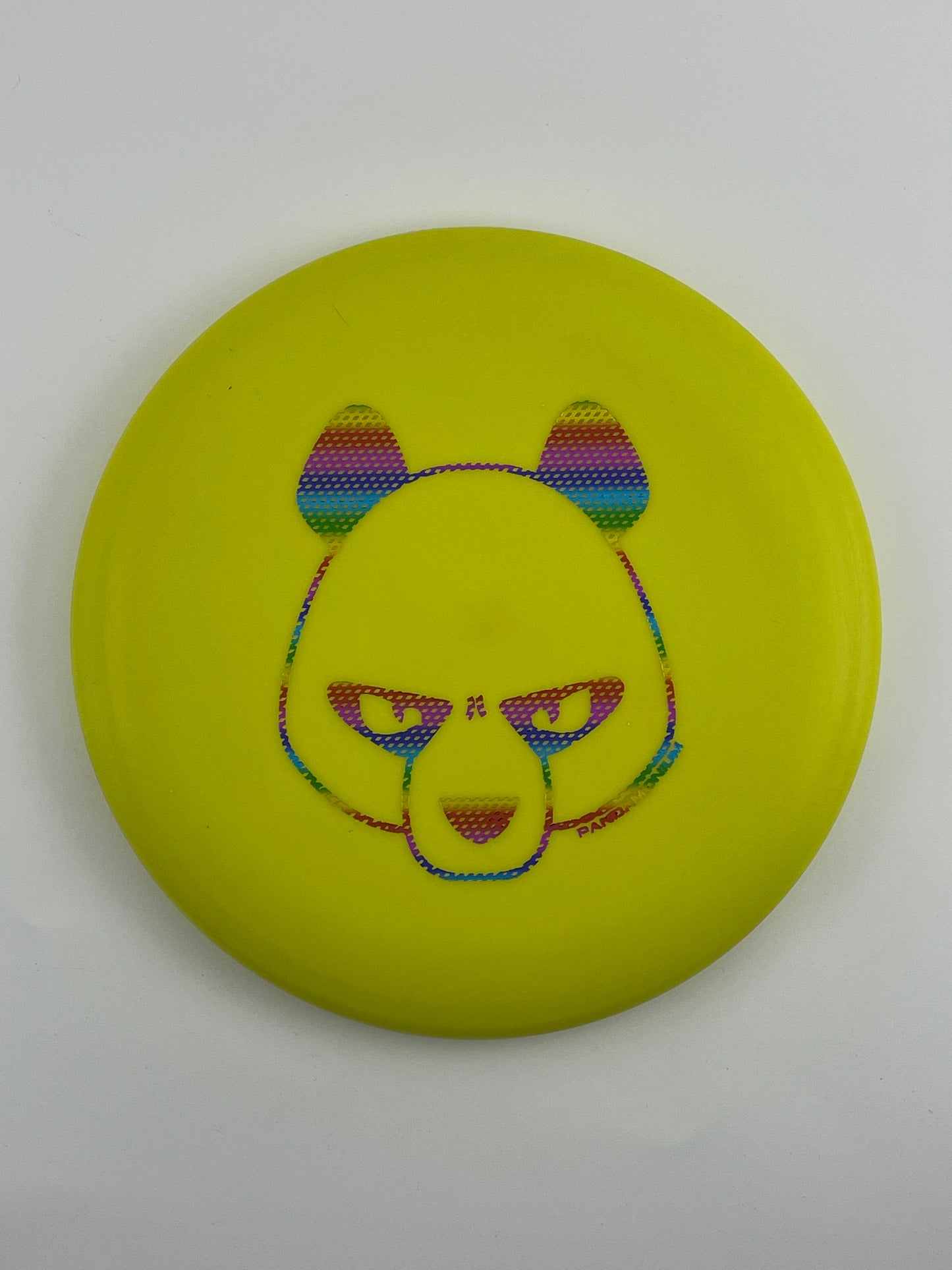 Innova JK Aviar disc golf putt and approach in yellow Pro plastic with Pandamonium Big Panda stamp