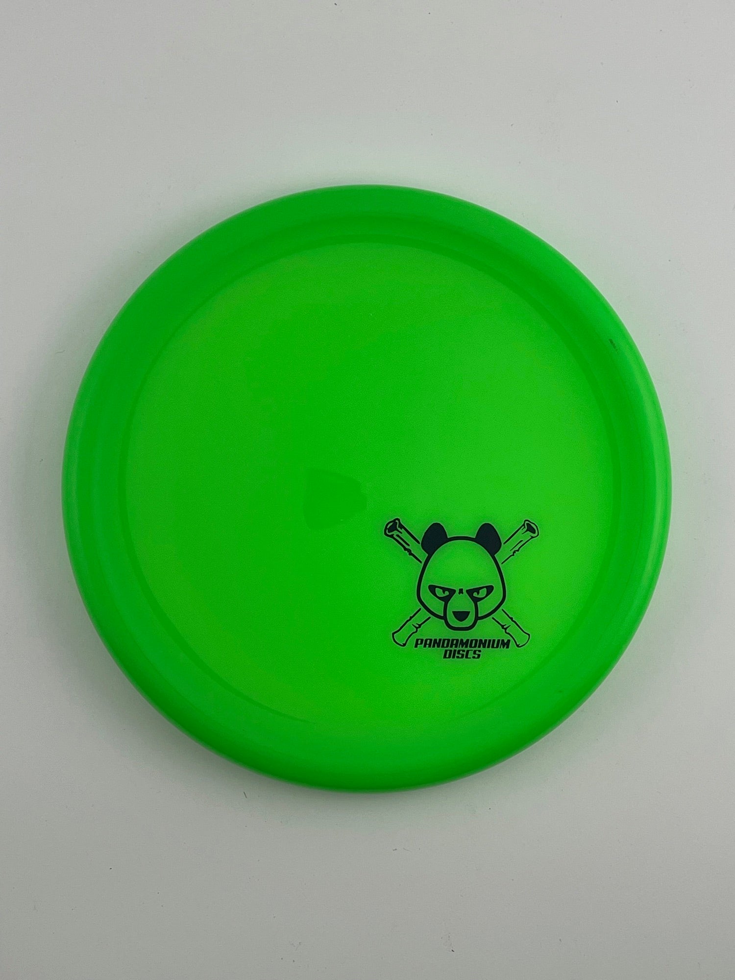 Kastaplast Berg X disc golf putt and approach in green K1 plastic with Pandamonium Panda Corner X stamp