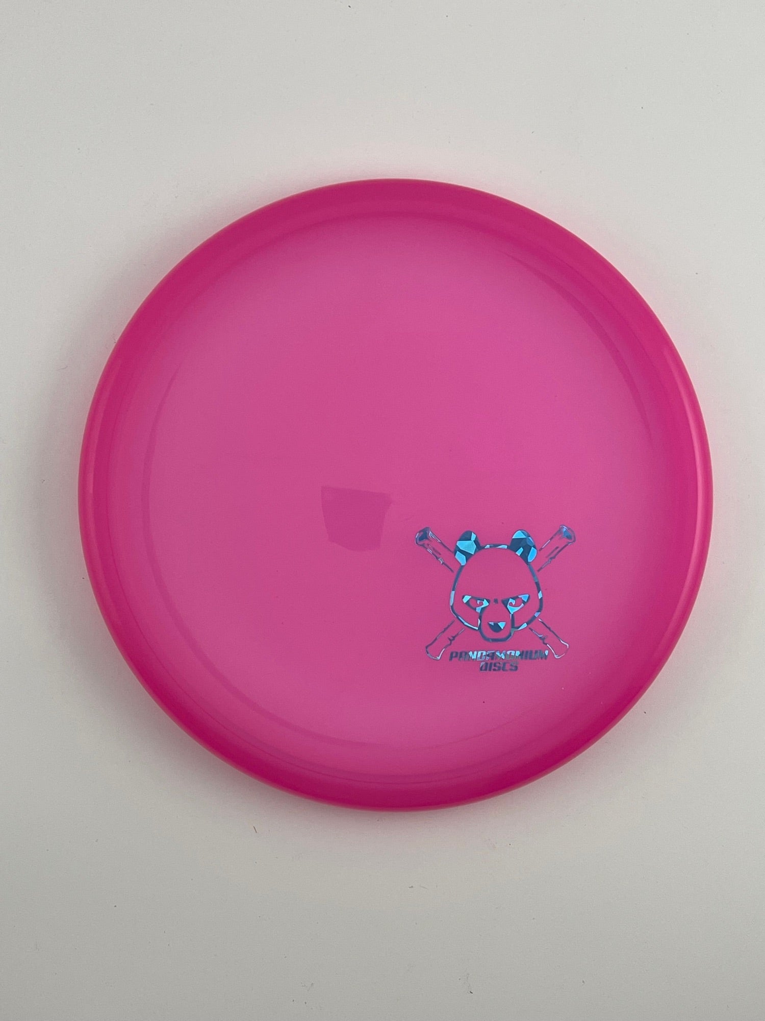 Kastaplast Berg X disc golf putt and approach in pink K1 plastic with Pandamonium Panda Corner X stamp