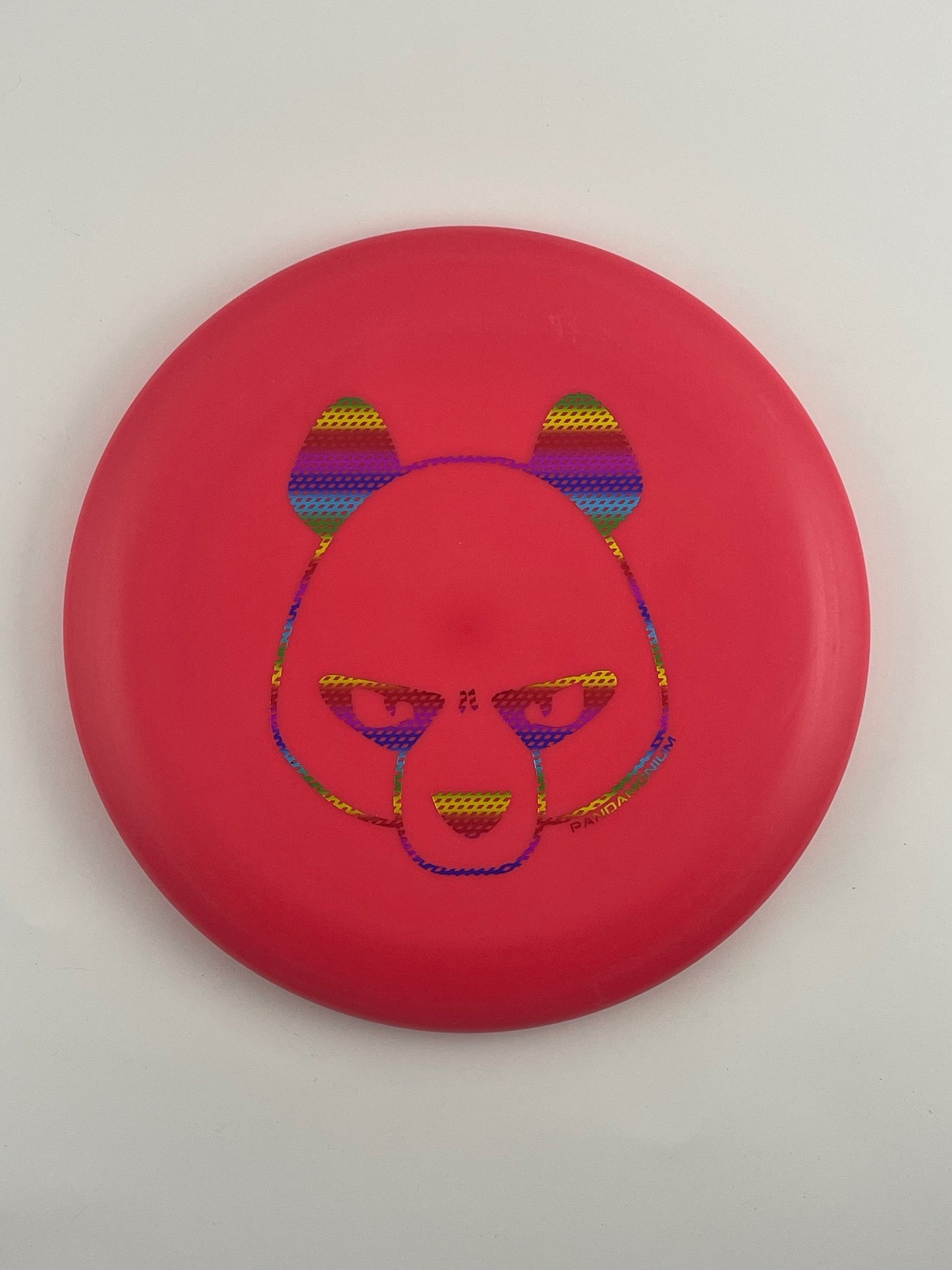 Innova KC Aviar disc golf putt and approach in magenta Pro plastic with Pandamonium Big Panda stamp