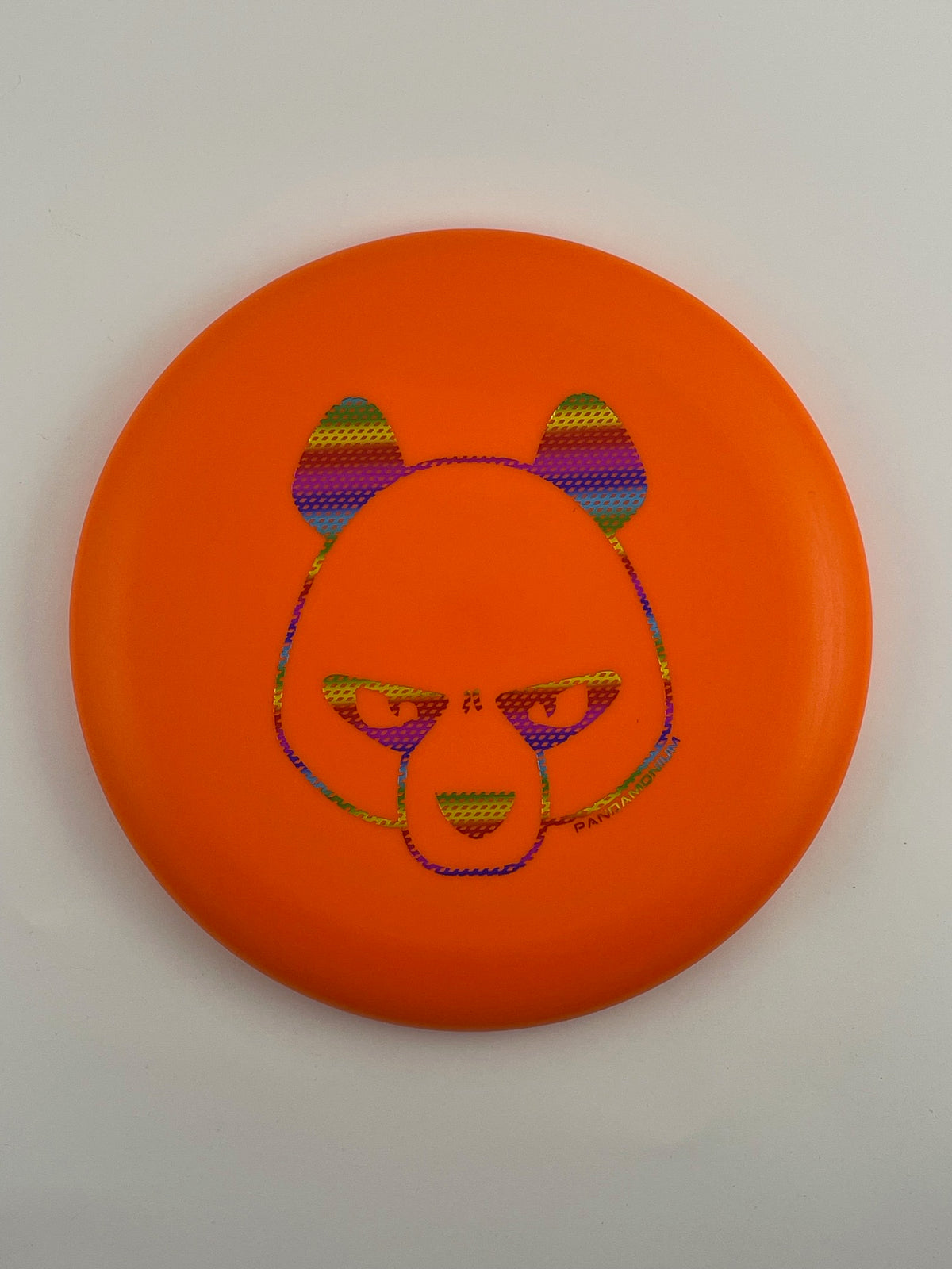 Innova KC Aviar disc golf putt and approach in orange Pro plastic with Pandamonium Big Panda stamp
