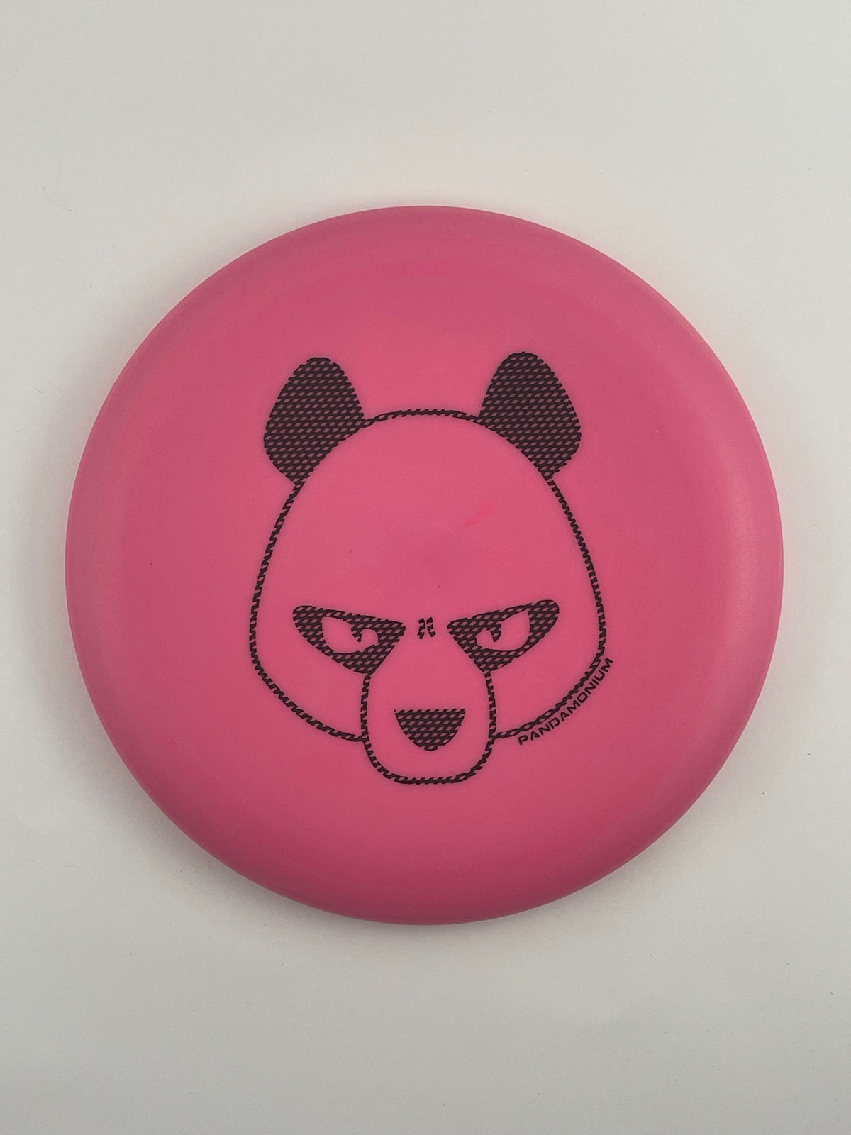 Innova KC Aviar disc golf putt and approach in pink Pro plastic with Pandamonium Big Panda stamp