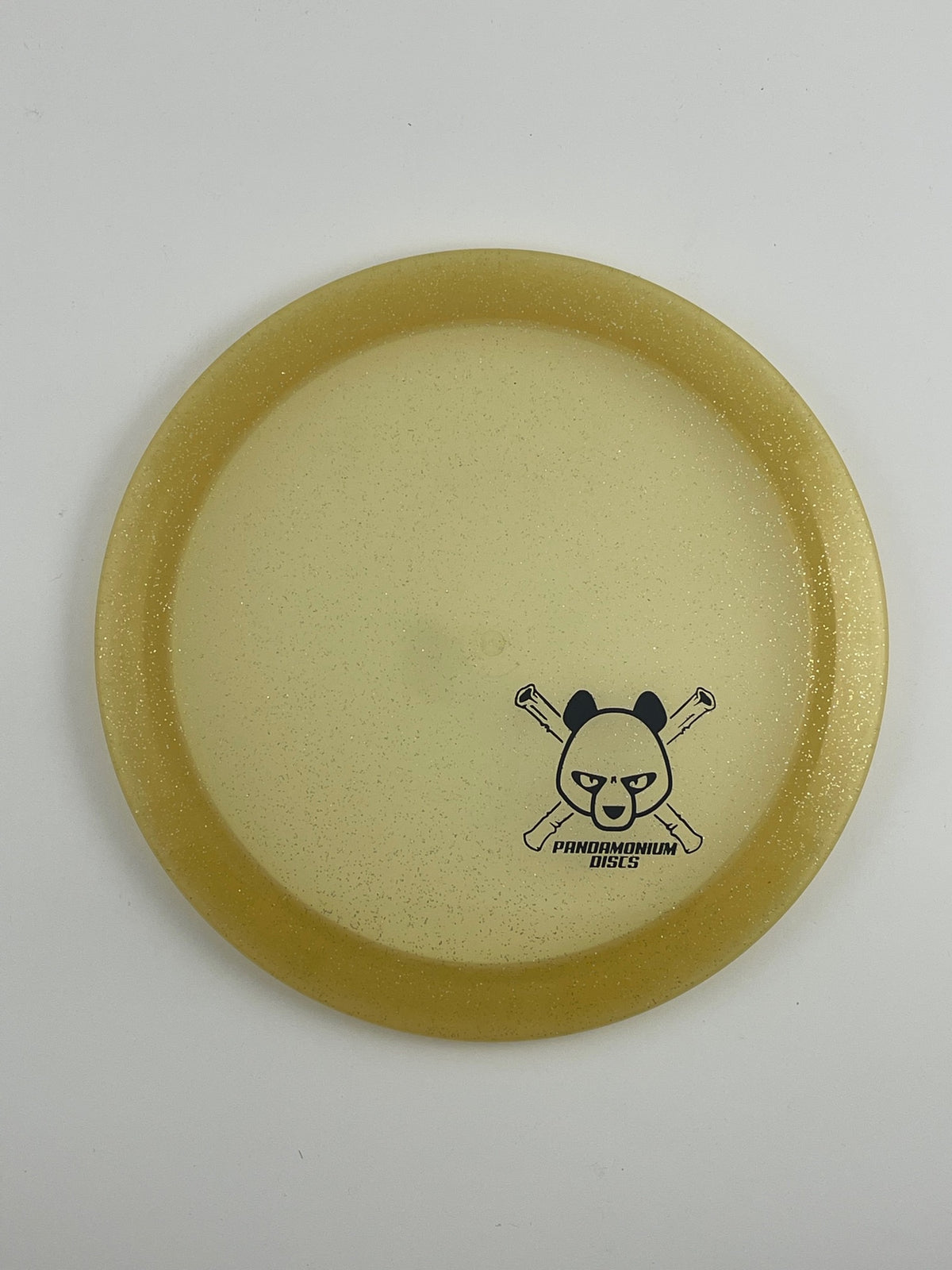 Dynamic Discs Felon disc golf fairway driver in gold Lucid Sparkle plastic with Pandamonium Panda Corner X stamp