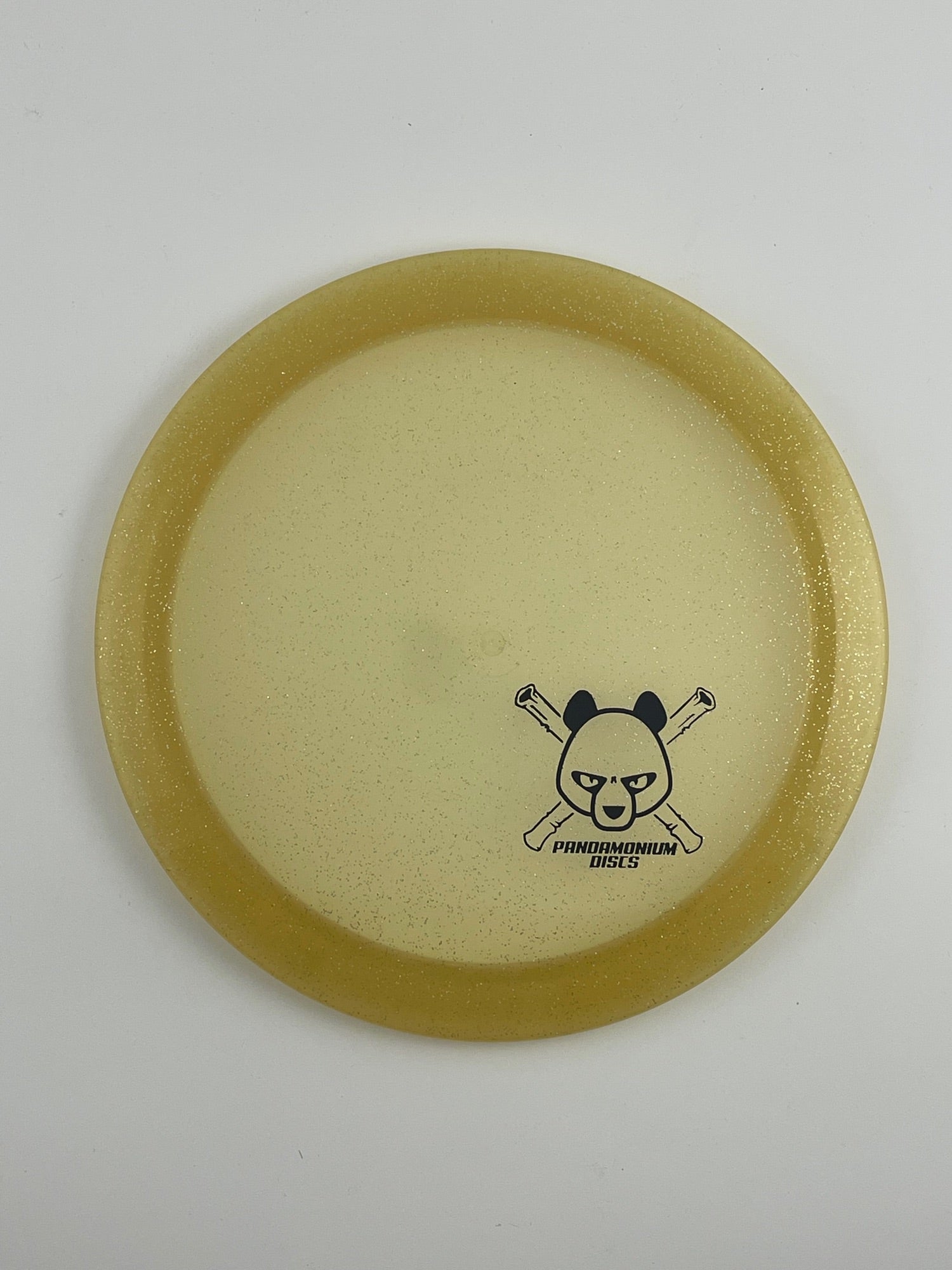 Dynamic Discs Felon disc golf fairway driver in gold Lucid Sparkle plastic with Pandamonium Panda Corner X stamp