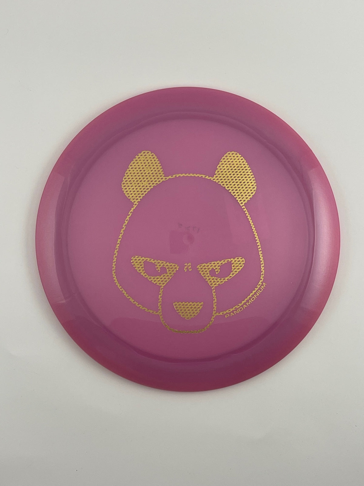 Innova Destroyer disc golf distance driver in pink Luster Champion plastic with Pandamonium Big Panda stamp
