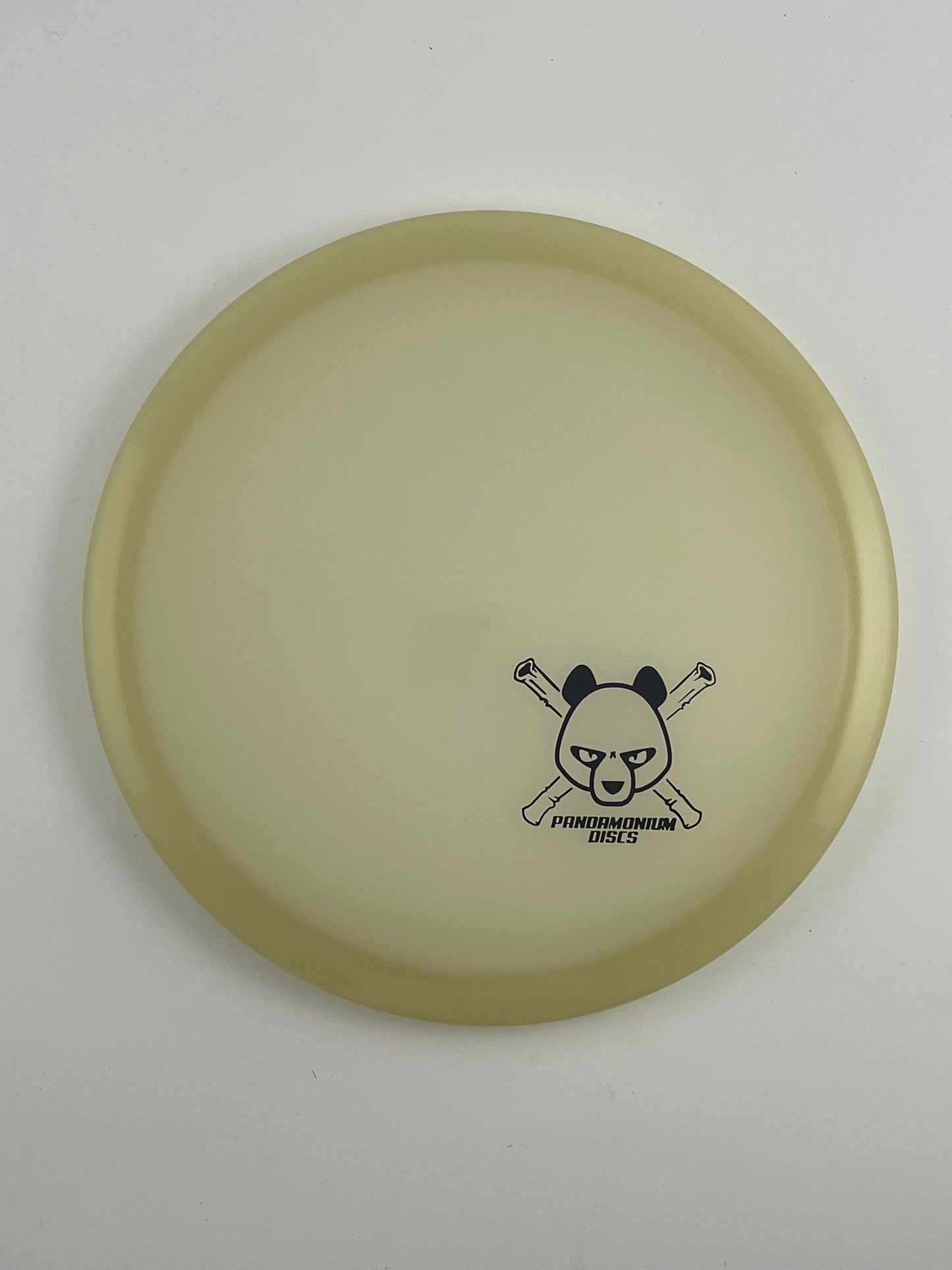 Dynamic Discs EMAC Truth disc golf midrange in glow Moonshine Glow plastic with Pandamonium Panda Corner X stamp