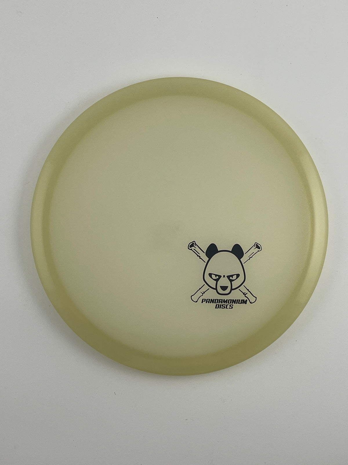 Dynamic Discs EMAC Truth disc golf midrange in glow Moonshine Glow plastic with Pandamonium Panda Corner X stamp