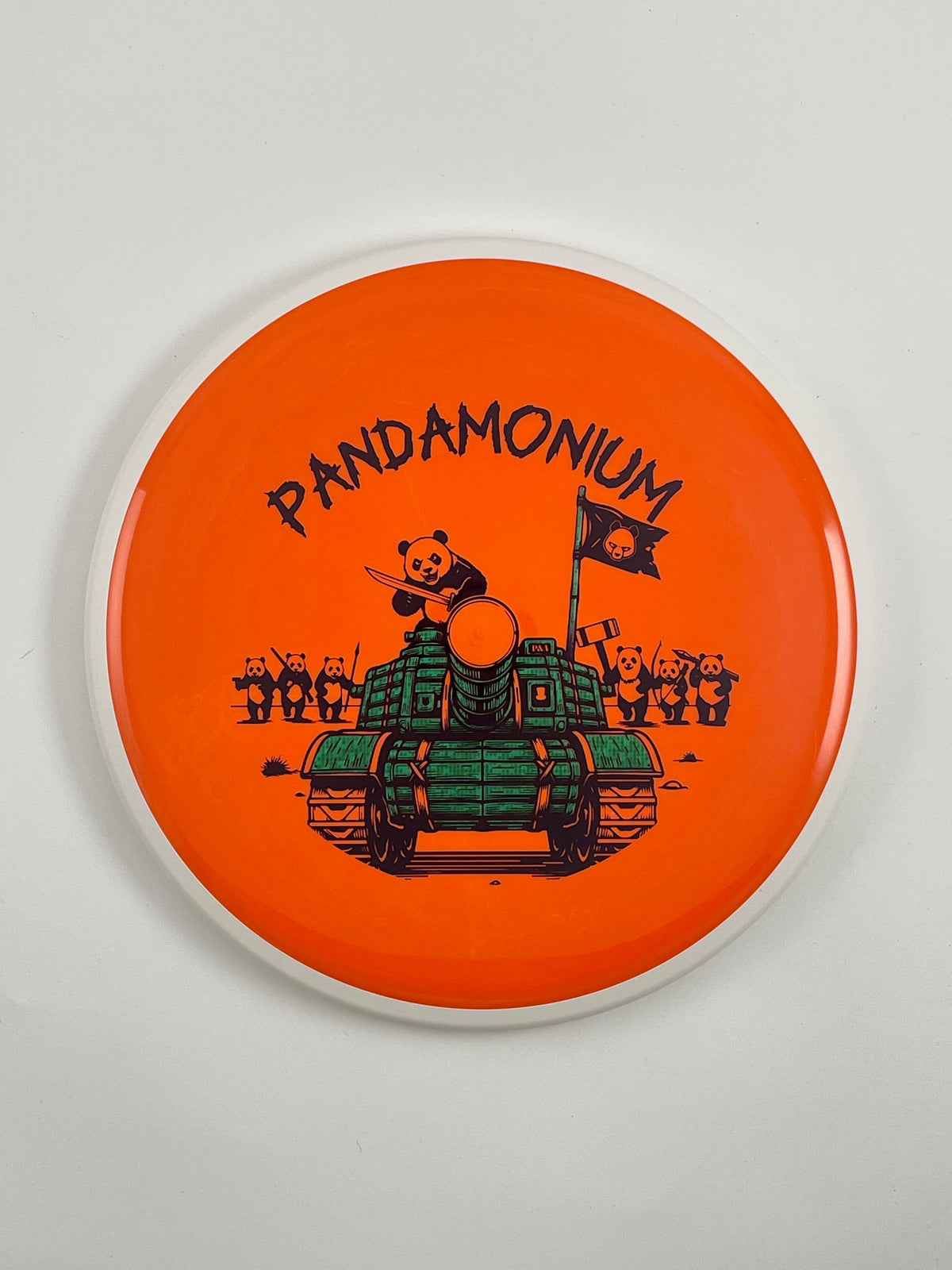 MVP Detour disc golf midrange in orange Neutron plastic with Pandamonium Panda Tank stamp