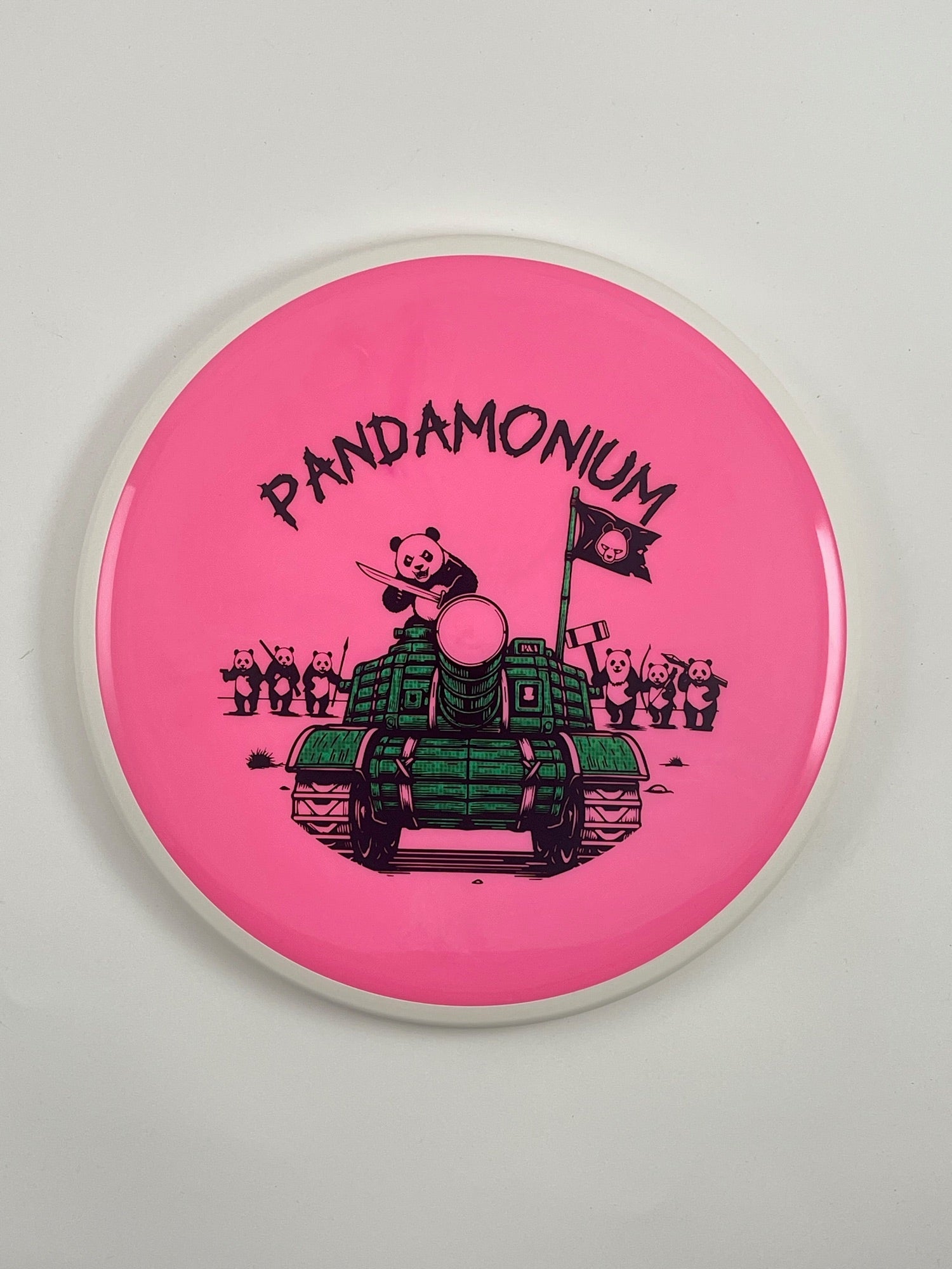 MVP Detour disc golf midrange in pink Neutron plastic with Pandamonium Panda Tank stamp
