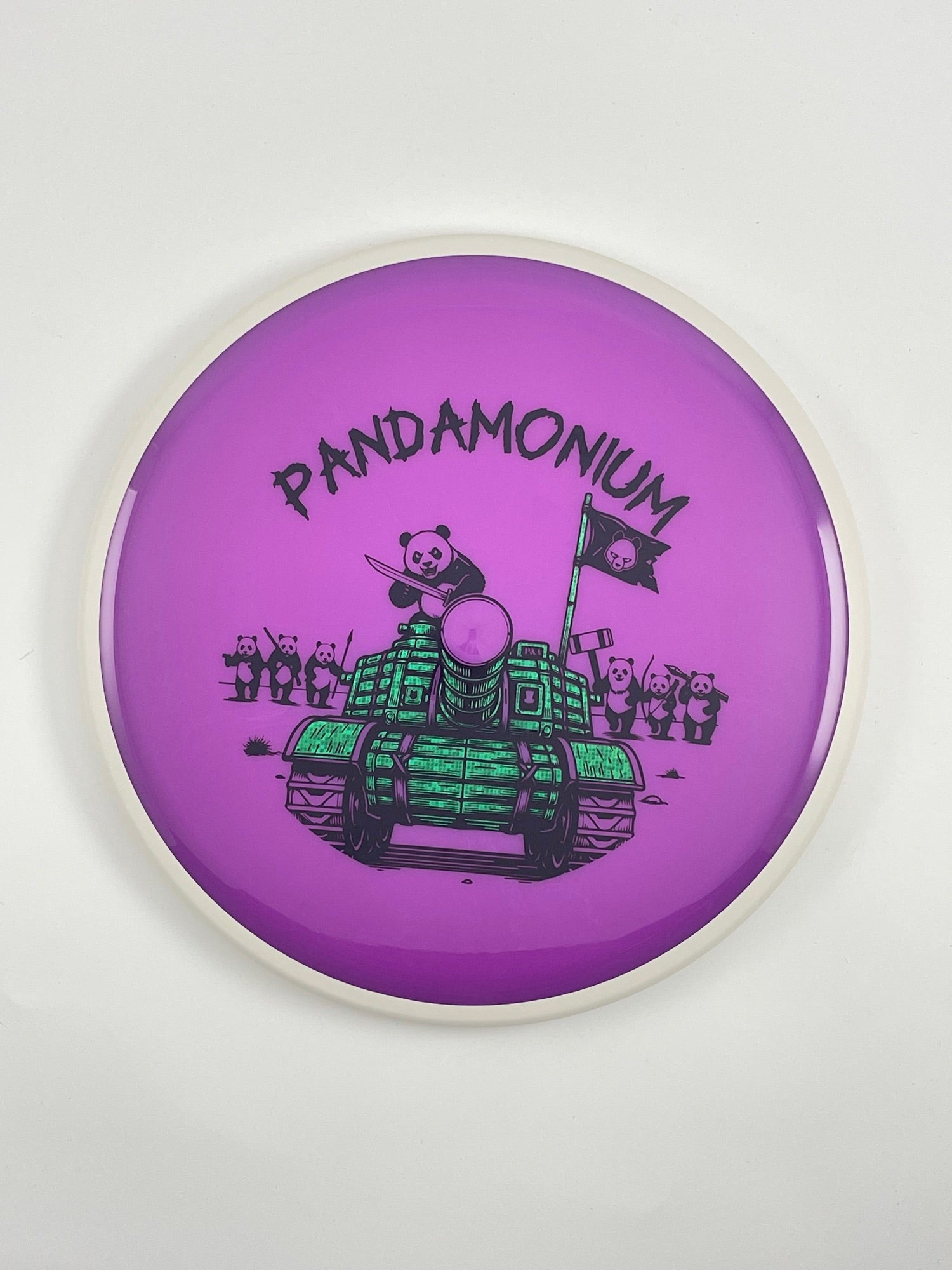MVP Detour disc golf midrange in purple Neutron plastic with Pandamonium Panda Tank stamp