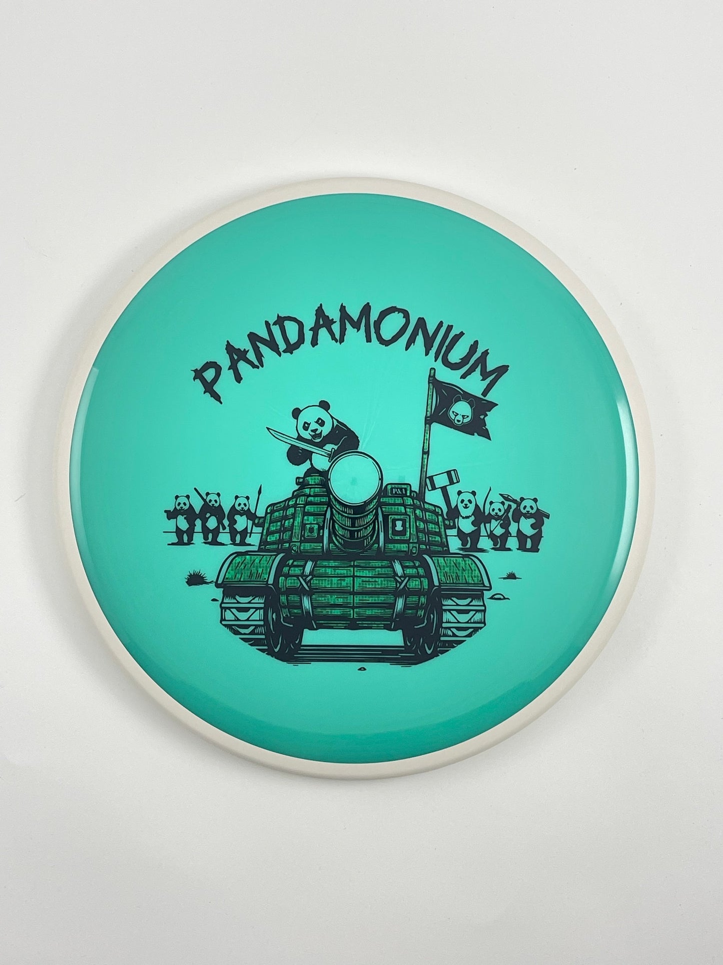 MVP Detour disc golf midrange in seafoam Neutron plastic with Pandamonium Panda Tank stamp