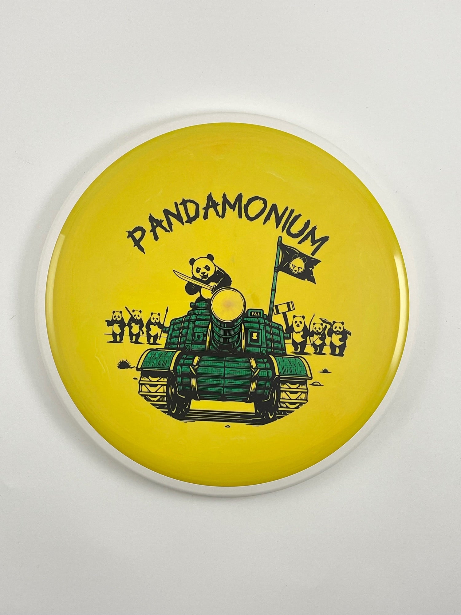 MVP Detour disc golf midrange in yellow Neutron plastic with Pandamonium Panda Tank stamp