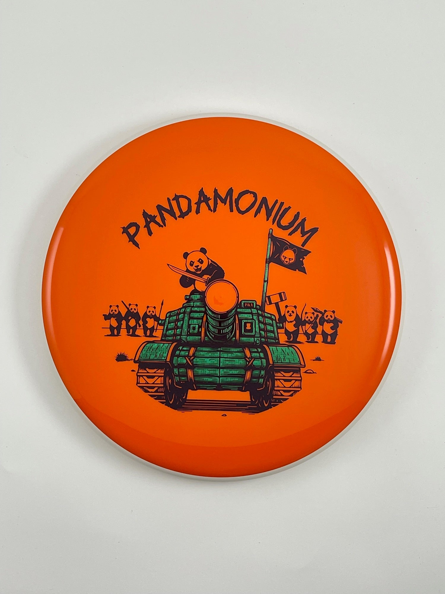 MVP Glitch disc golf putt and approach in orange Neutron plastic with Pandamonium Panda Tank stamp