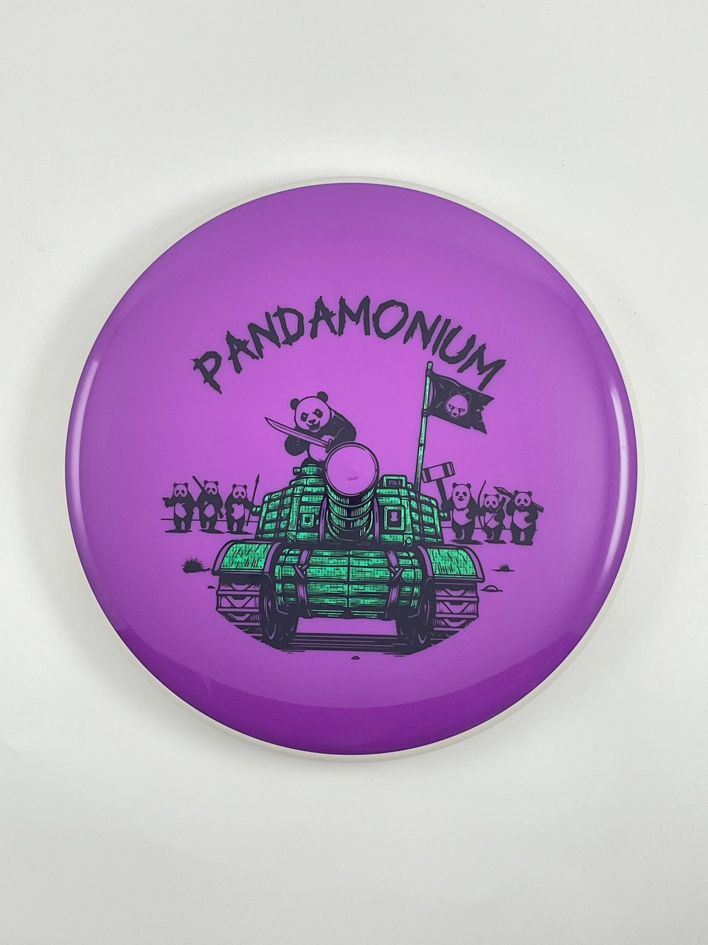 MVP Glitch disc golf putt and approach in purple Neutron plastic with Pandamonium Panda Tank stamp