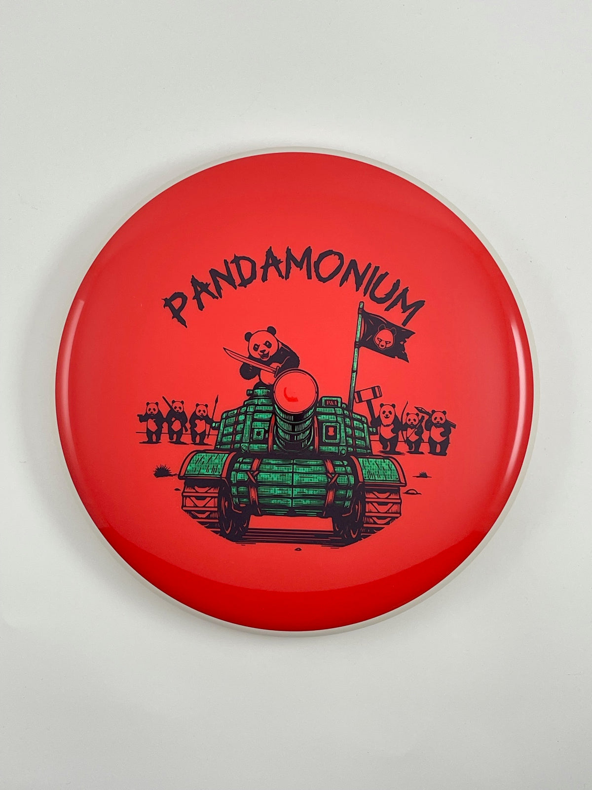 MVP Glitch disc golf putt and approach in red Neutron plastic with Pandamonium Panda Tank stamp
