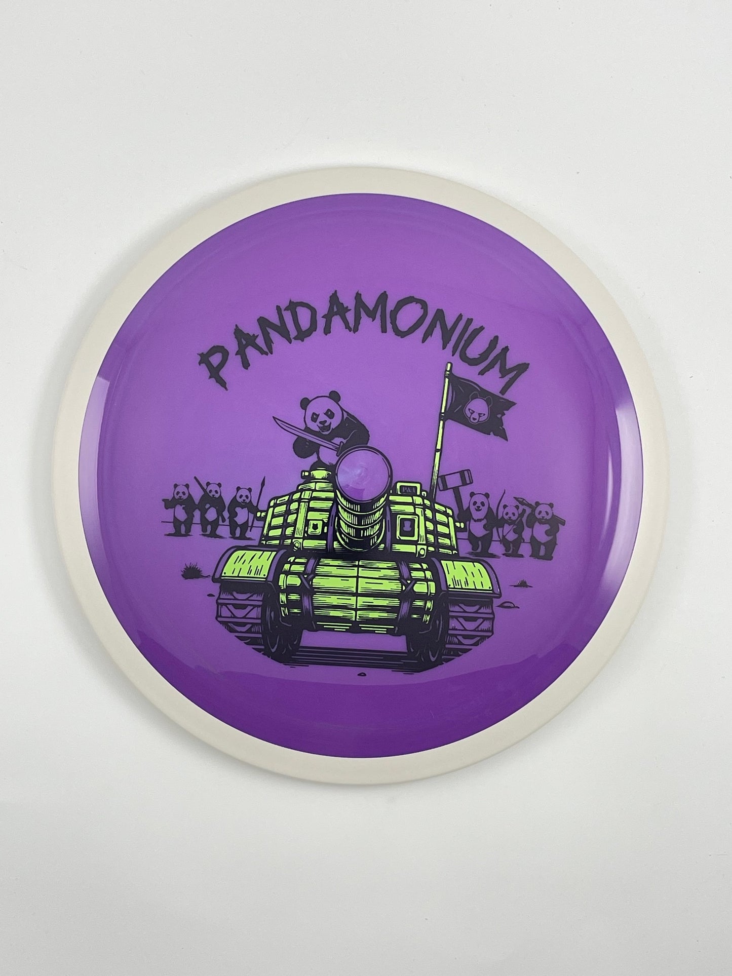 MVP Trail disc golf distance driver in purple Neutron plastic with Pandamonium Panda Tank stamp
