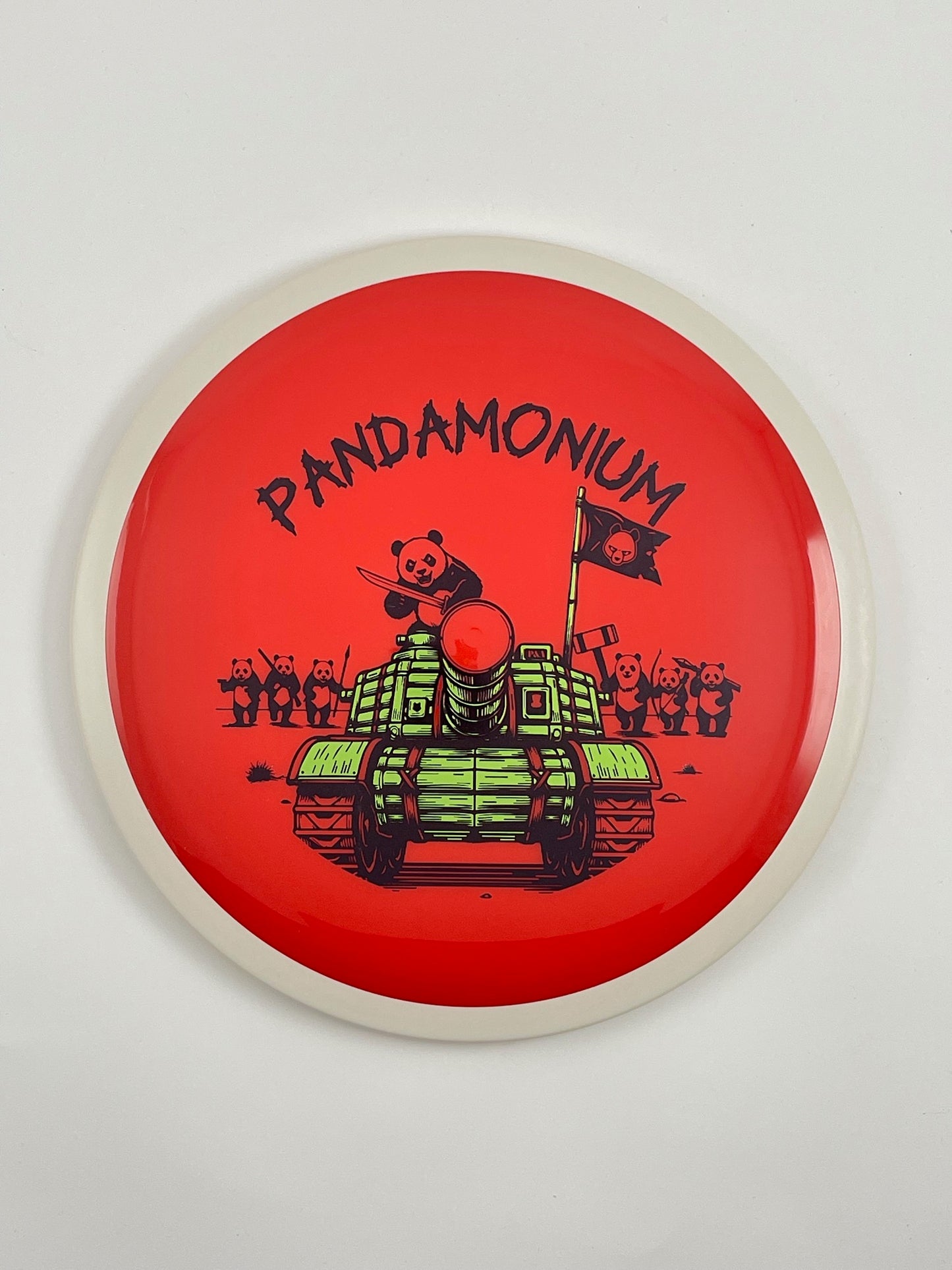 MVP Trail disc golf distance driver in red Neutron plastic with Pandamonium Panda Tank stamp
