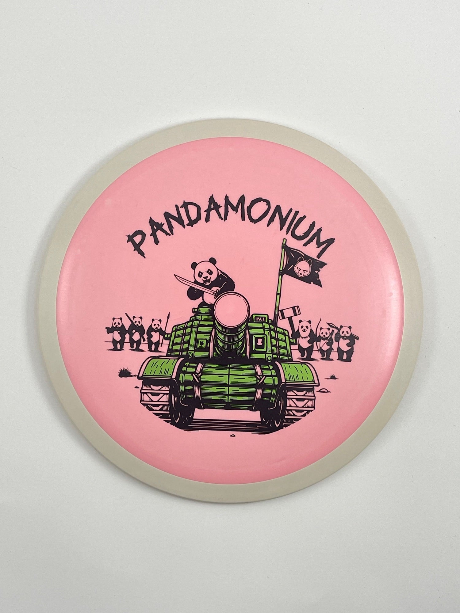 MVP Wave disc golf distance driver in pink Fission plastic with Pandamonium Panda Tank stamp