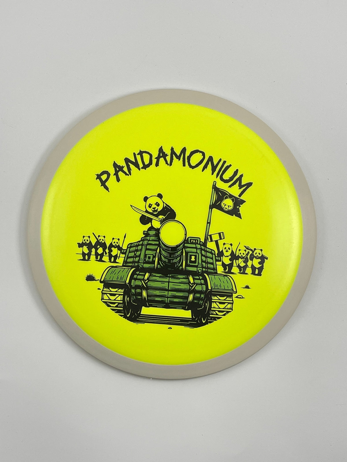MVP Wave disc golf distance driver in yellow Fission plastic with Pandamonium Panda Tank stamp