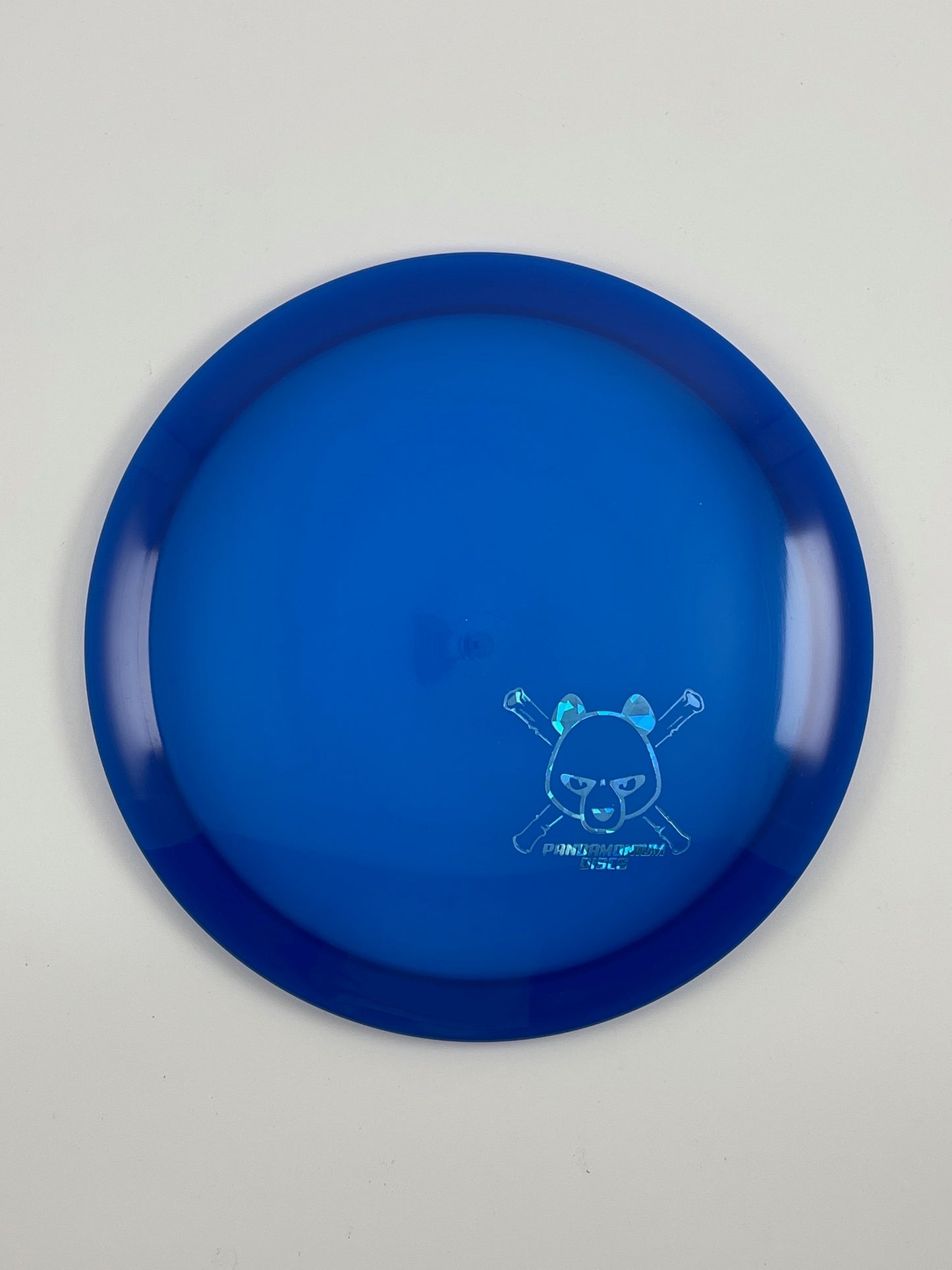 Latitude 64 River disc golf fairway driver in blue Opto plastic with Pandamonium Panda Corner X stamp