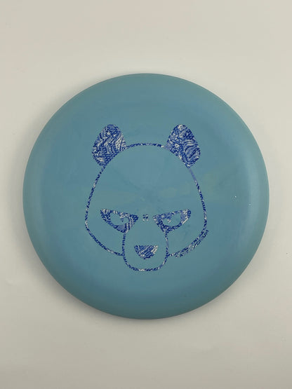 Innova Pig disc golf putt and approach in sky blue R-Pro plastic with Pandamonium Big Panda stamp
