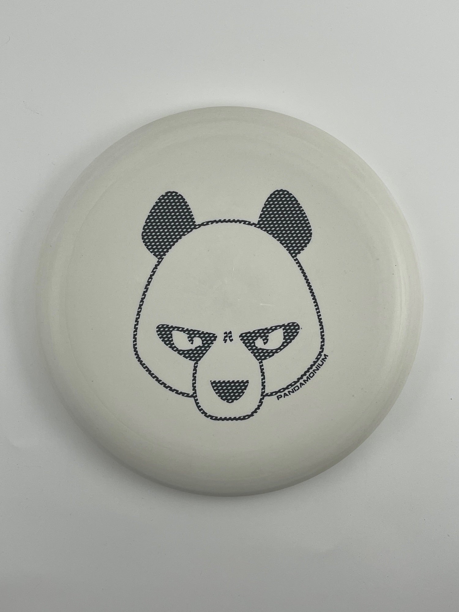 Innova Pig disc golf putt and approach in white R-Pro plastic with Pandamonium Big Panda stamp, view 2