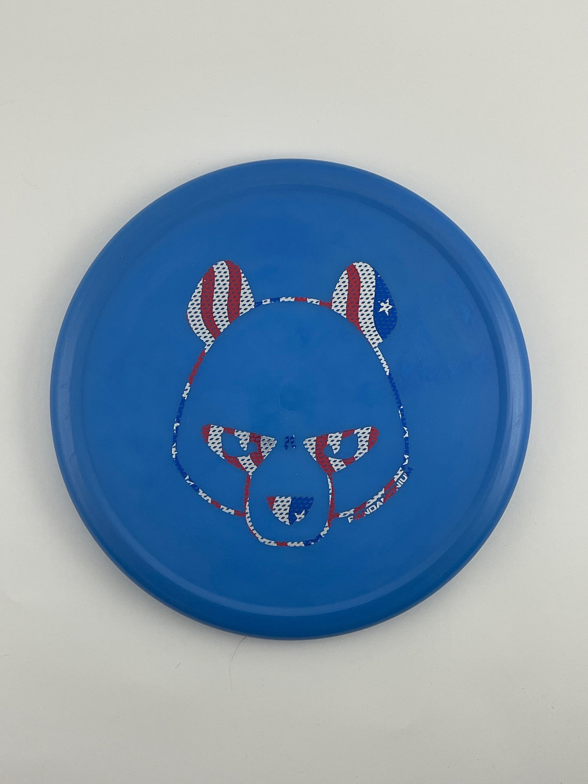 Innova Pig disc golf putt and approach in blue R-Pro plastic with Pandamonium Big Panda stamp