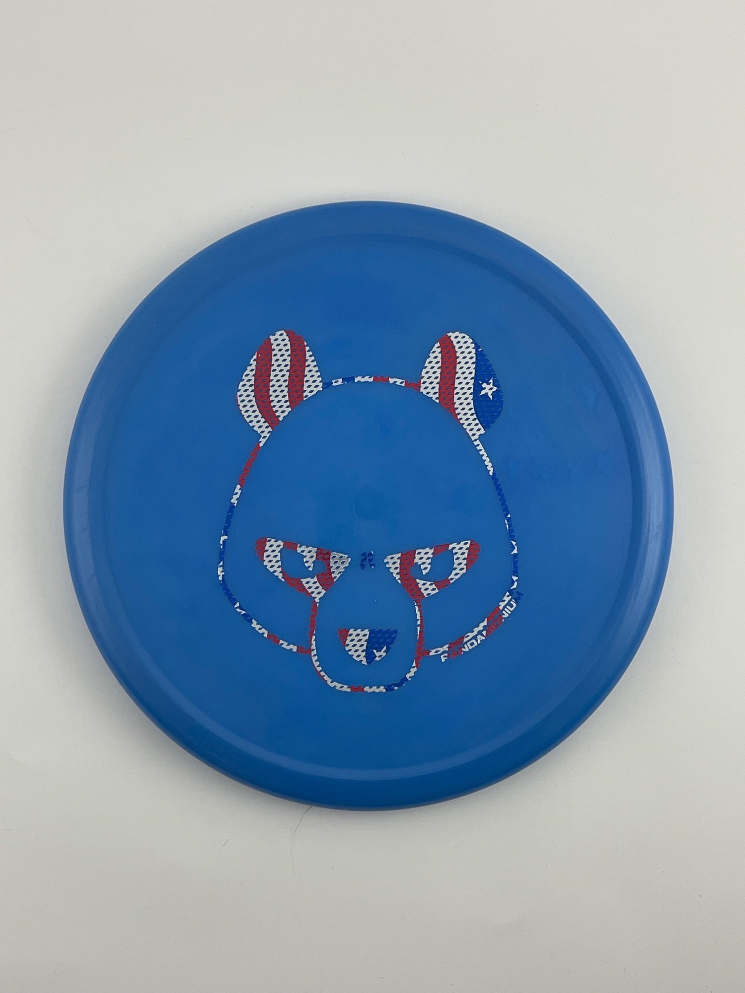 Innova Pig disc golf putt and approach in blue R-Pro plastic with Pandamonium Big Panda stamp