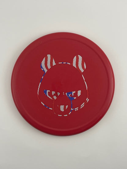 Innova Pig disc golf putt and approach in red R-Pro plastic with Pandamonium Big Panda stamp, view 1