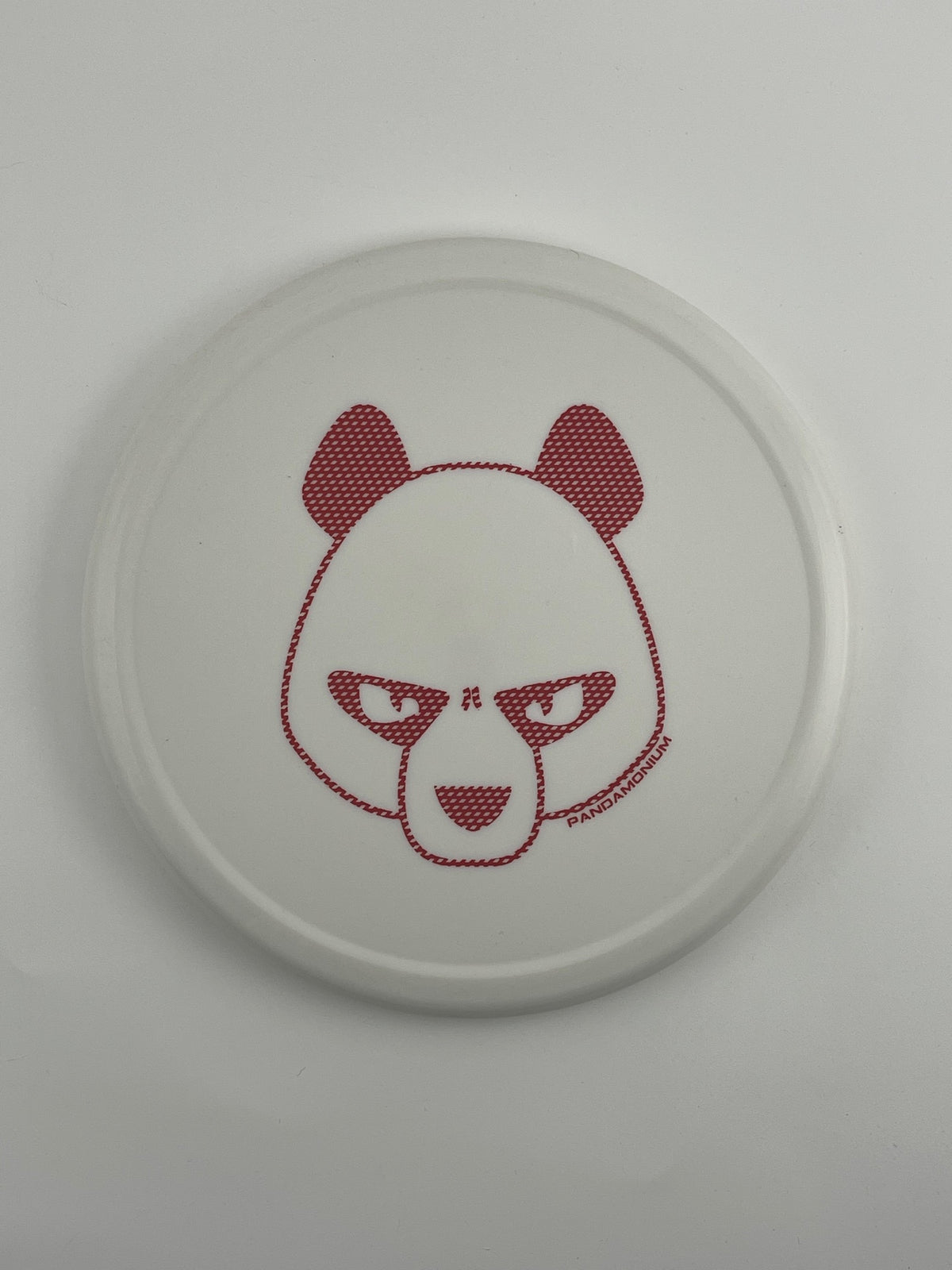 Innova Pig disc golf putt and approach in white R-Pro plastic with Pandamonium Big Panda stamp, view 1