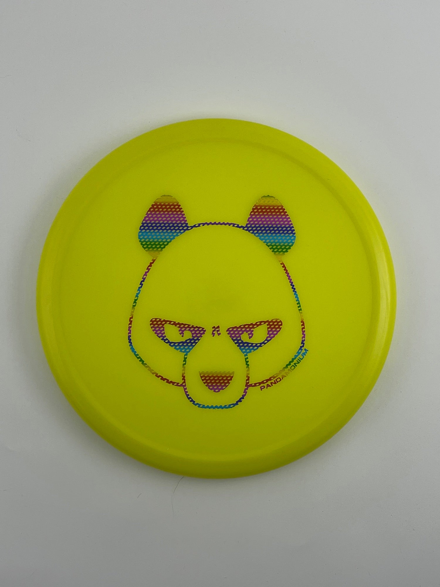 Innova Pig disc golf putt and approach in yellow R-Pro plastic with Pandamonium Big Panda stamp