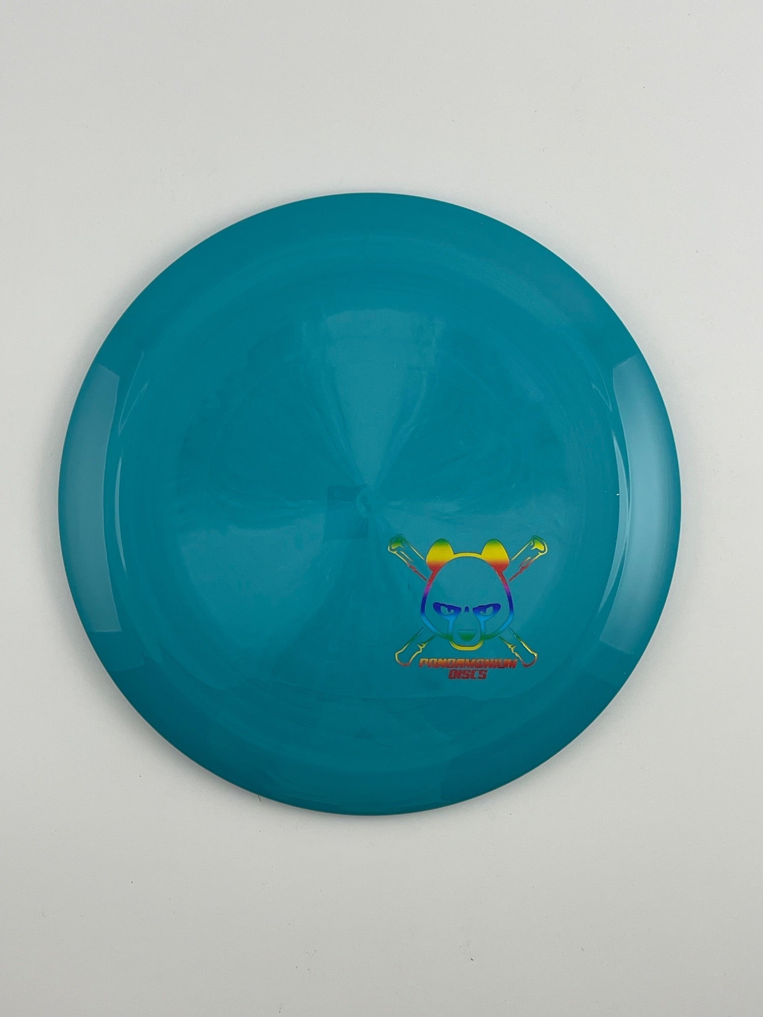 Latitude 64 Grace disc golf distance driver in teal Royal Grand plastic with Pandamonium Panda Corner X stamp