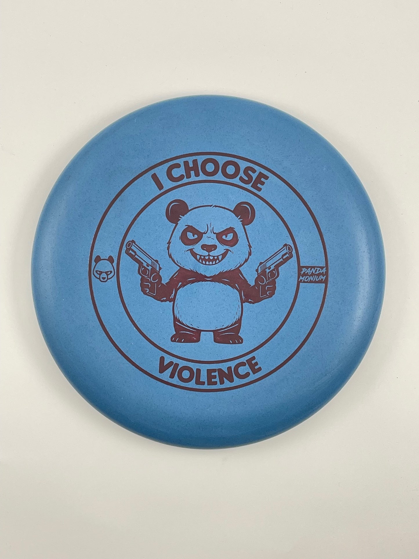 Discraft Luna disc golf putt and approach in blue Rubber Blend plastic with Pandamonium I Choose Violence stamp