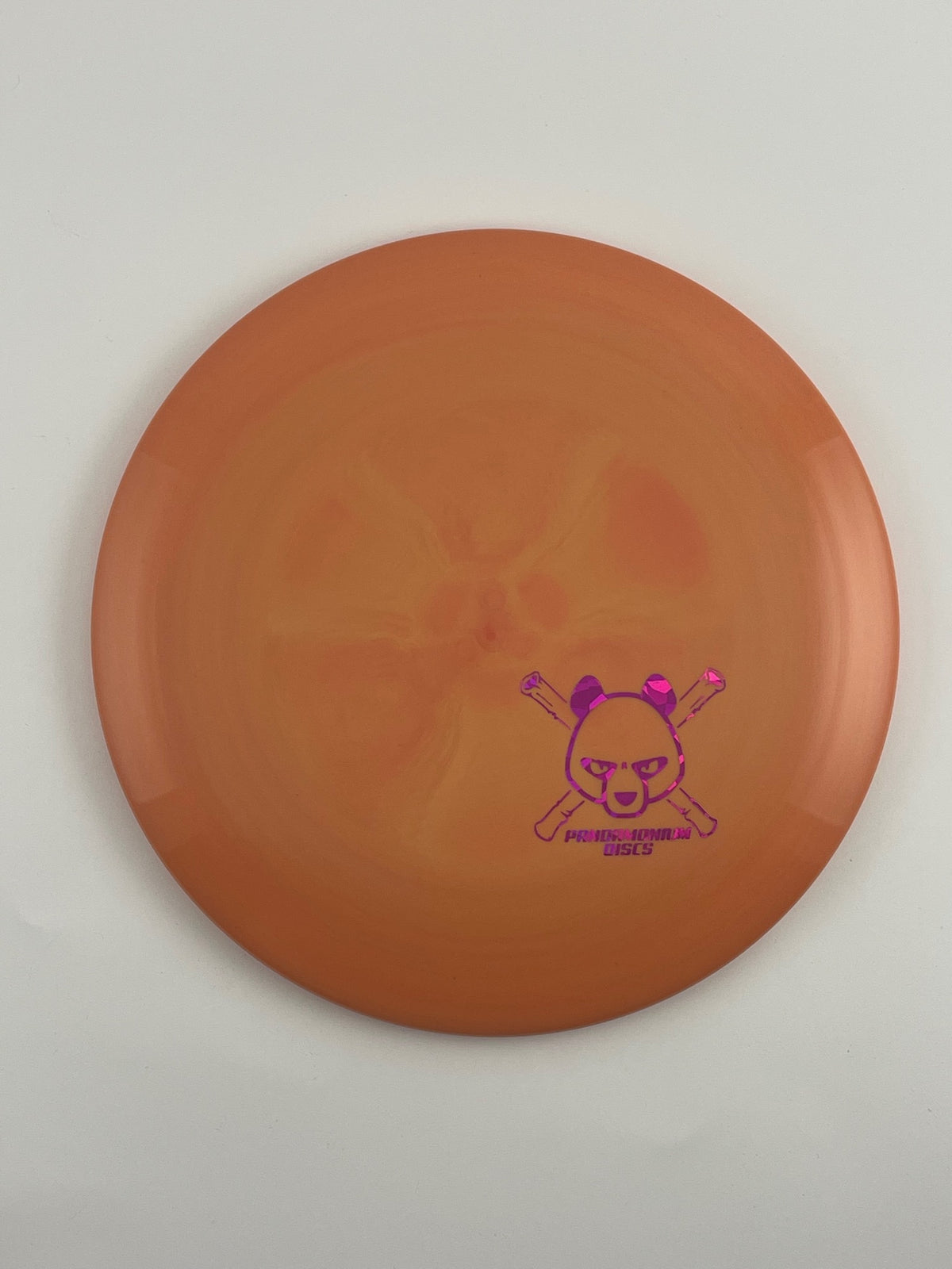 Discmania FD disc golf fairway driver in orange S-Line Swirl plastic with Pandamonium Panda Corner X stamp
