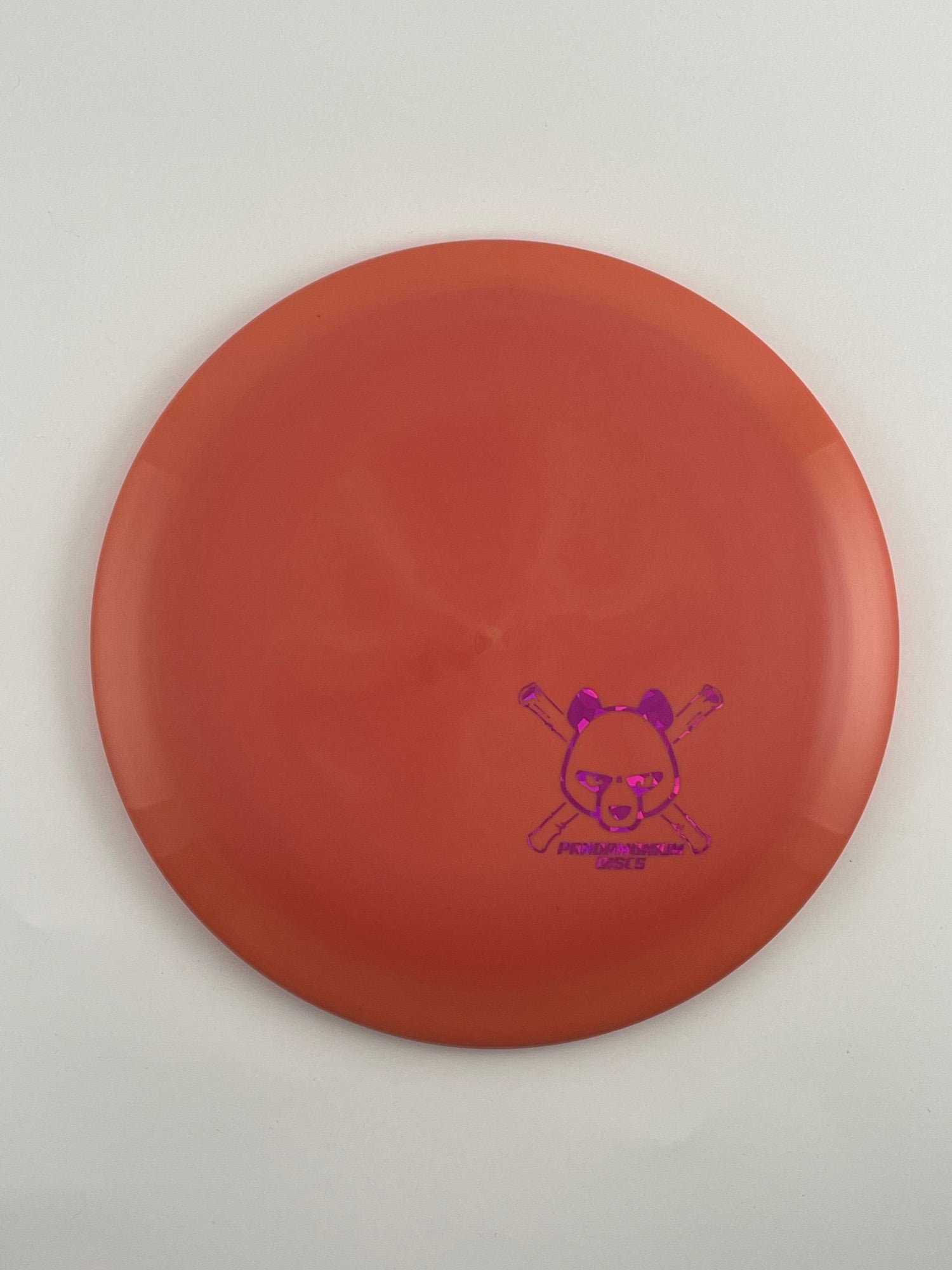 Discmania FD disc golf fairway driver in red and orange S-Line Swirl plastic with Pandamonium Panda Corner X stamp