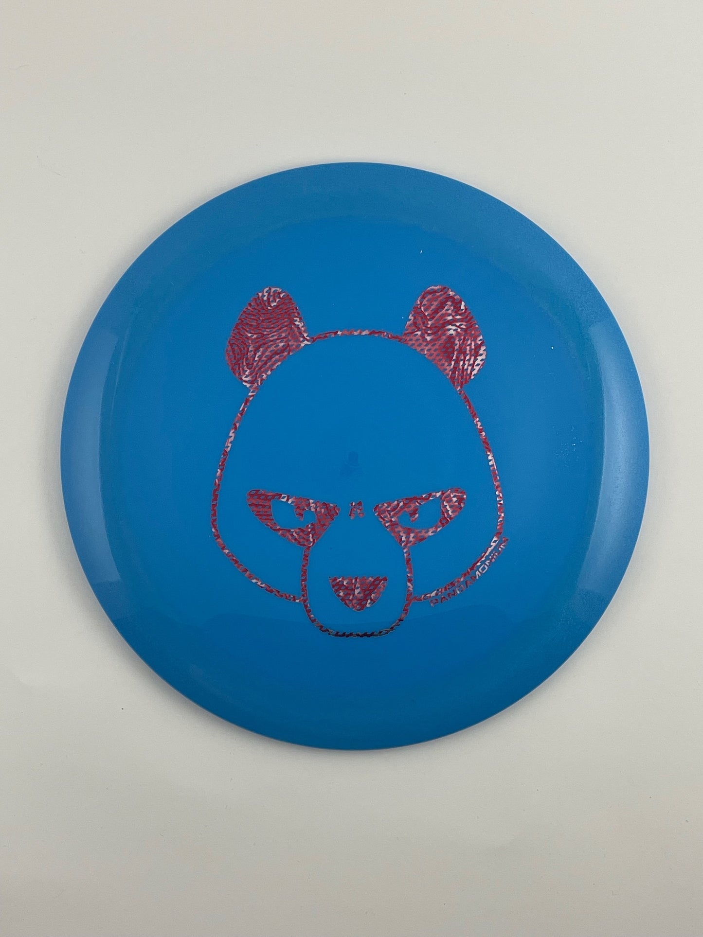 Innova Destroyer disc golf distance driver in blue Star plastic with Pandamonium Big Panda stamp