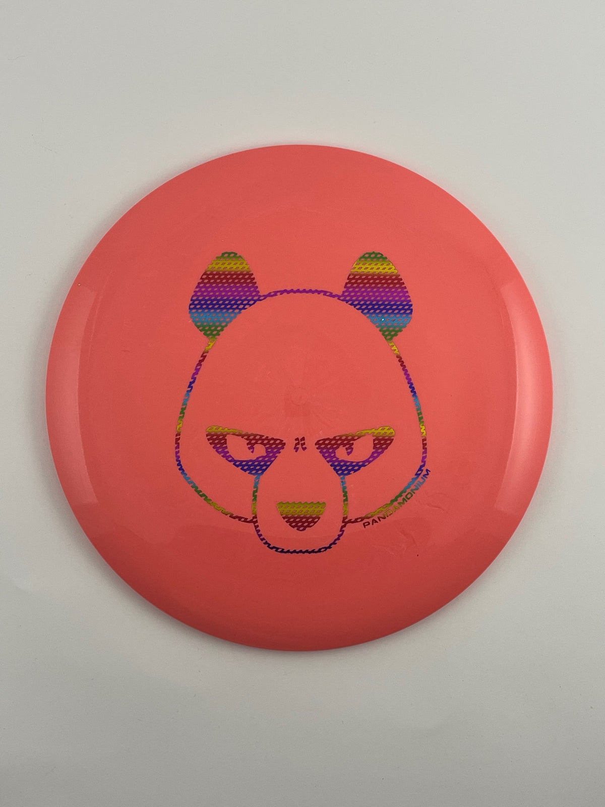Innova Destroyer disc golf distance driver in coral Star plastic with Pandamonium Big Panda stamp