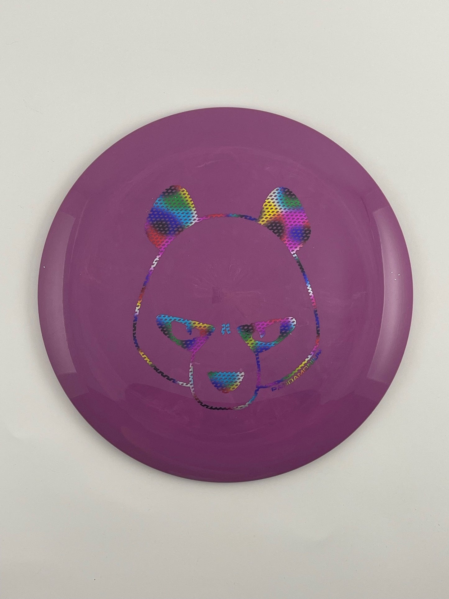 Innova Destroyer disc golf distance driver in purple Star plastic with Pandamonium Big Panda stamp
