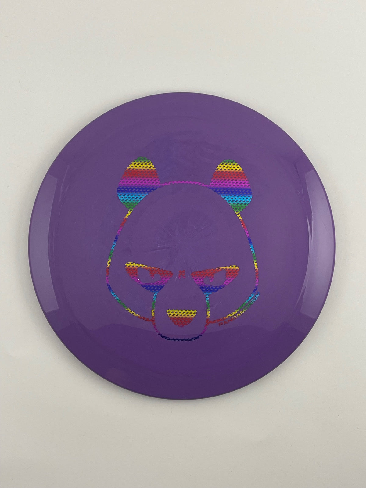 Innova Firebird disc golf fairway driver in purple Star plastic with Pandamonium Big Panda stamp