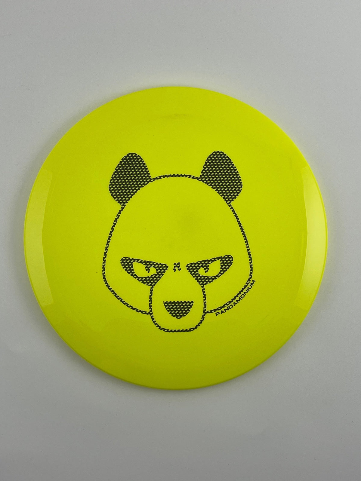 Innova Firebird disc golf fairway driver in yellow Star plastic with Pandamonium Big Panda stamp