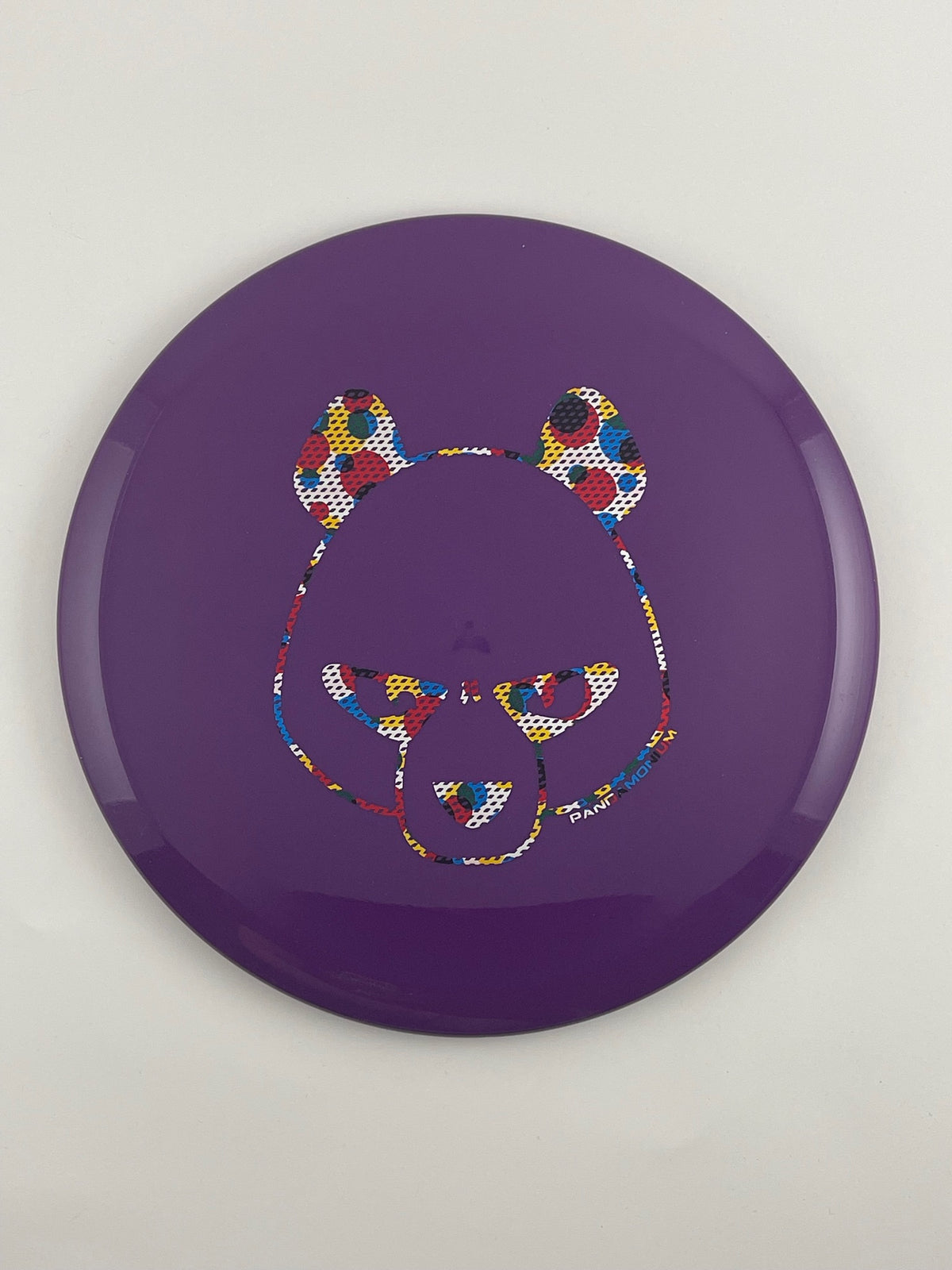 Innova Fox disc golf midrange in purple Star plastic with Pandamonium Big Panda stamp