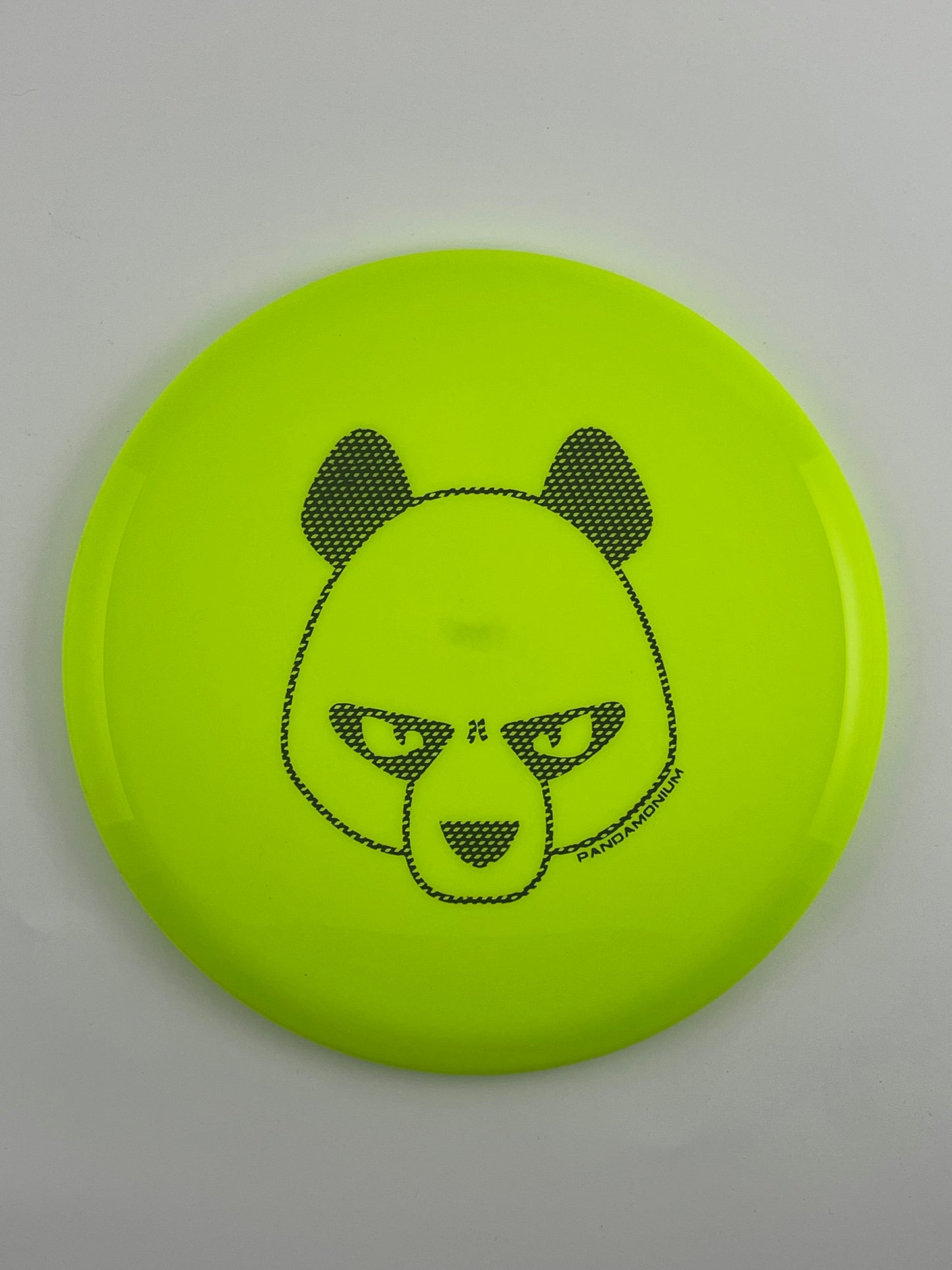 Innova Fox disc golf midrange in yellow Star plastic with Pandamonium Big Panda stamp