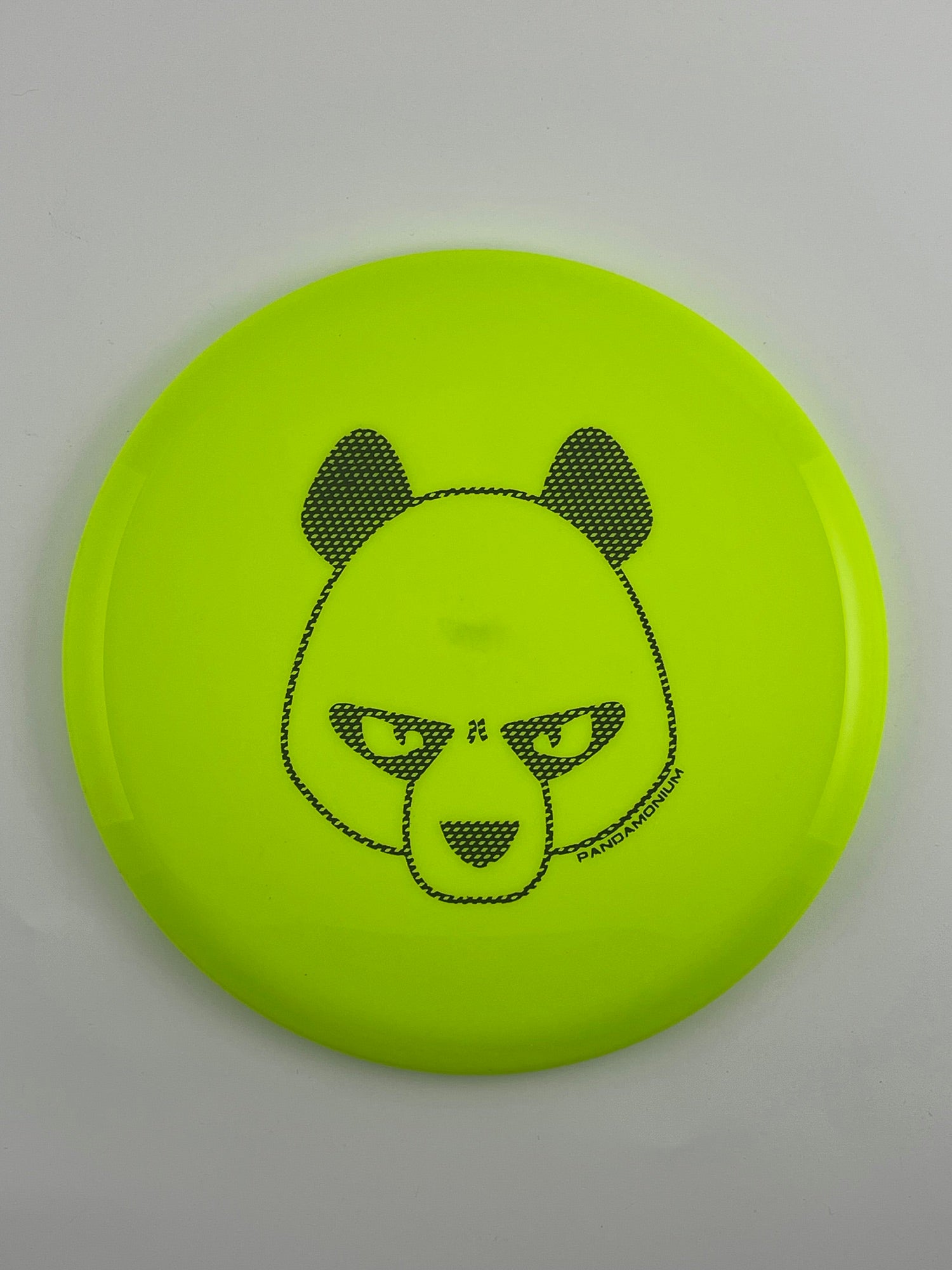 Innova Fox disc golf midrange in yellow Star plastic with Pandamonium Big Panda stamp