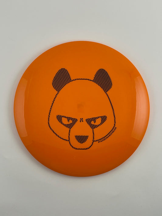 Innova Leopard disc golf fairway driver in orange Star plastic with Pandamonium Big Panda stamp