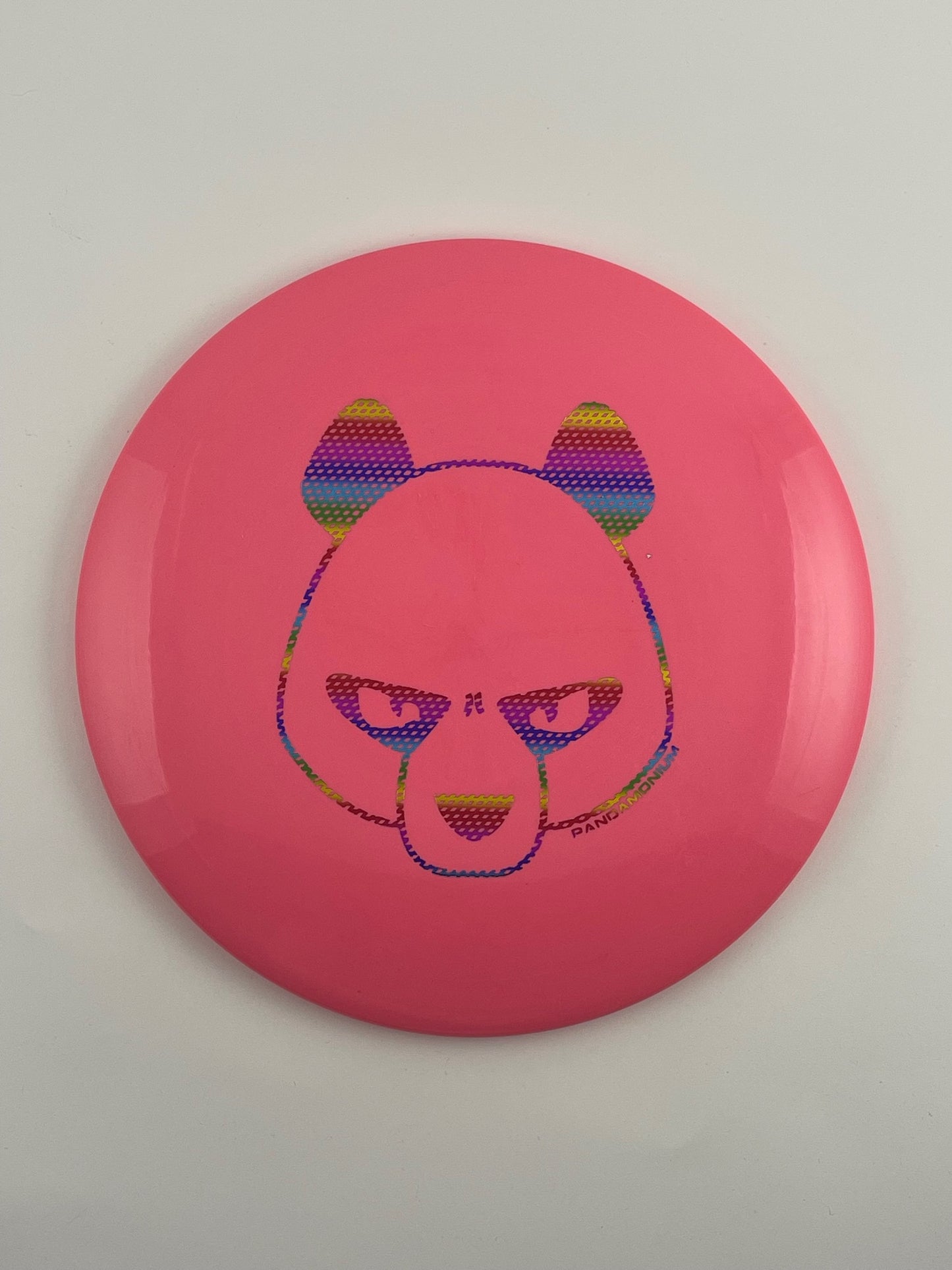 Innova Leopard disc golf fairway driver in pink Star plastic with Pandamonium Big Panda stamp