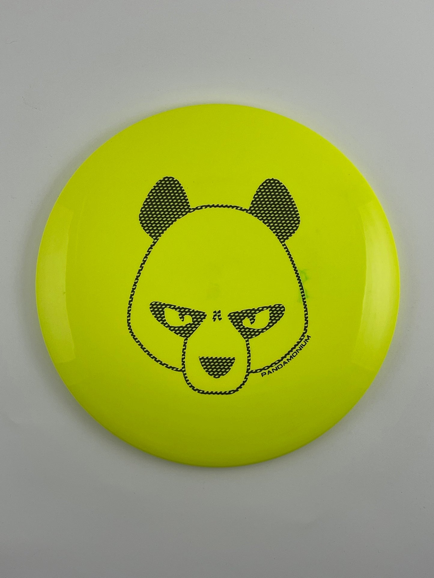 Innova Leopard disc golf fairway driver in yellow Star plastic with Pandamonium Big Panda stamp
