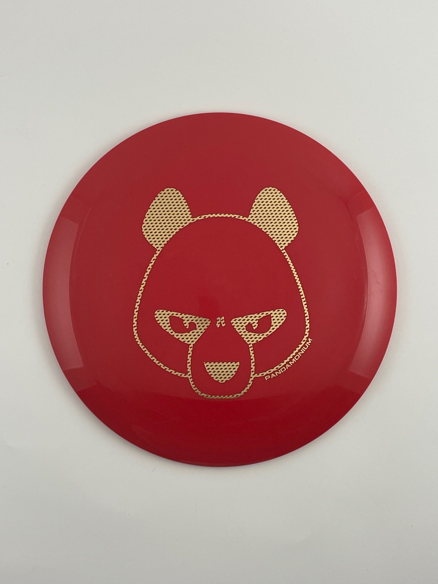 Innova Mamba disc golf distance driver in red Star plastic with Pandamonium Big Panda stamp, view 1