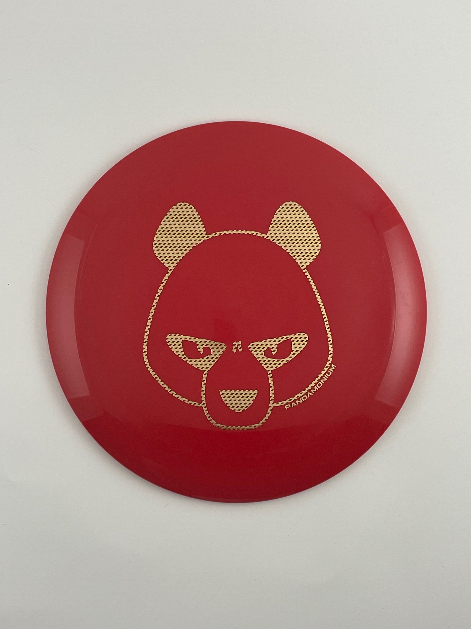 Innova Mamba disc golf distance driver in red Star plastic with Pandamonium Big Panda stamp, view 1