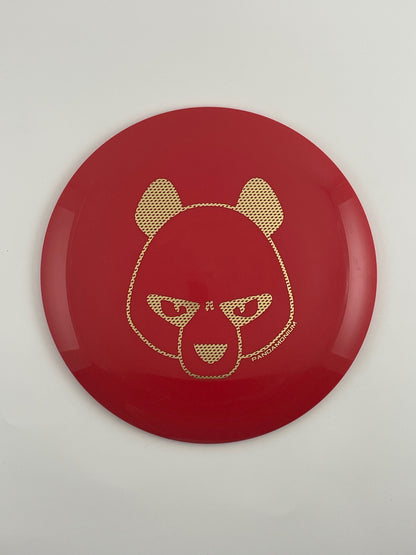 Innova Mamba disc golf distance driver in red Star plastic with Pandamonium Big Panda stamp, view 1