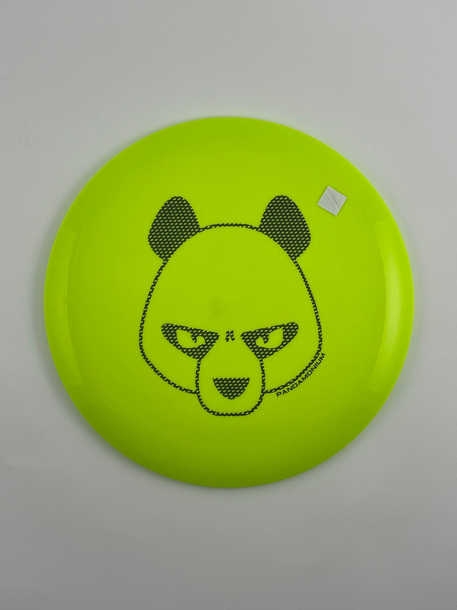 Innova Mamba disc golf distance driver in yellow Star plastic with Pandamonium Big Panda stamp, view 1